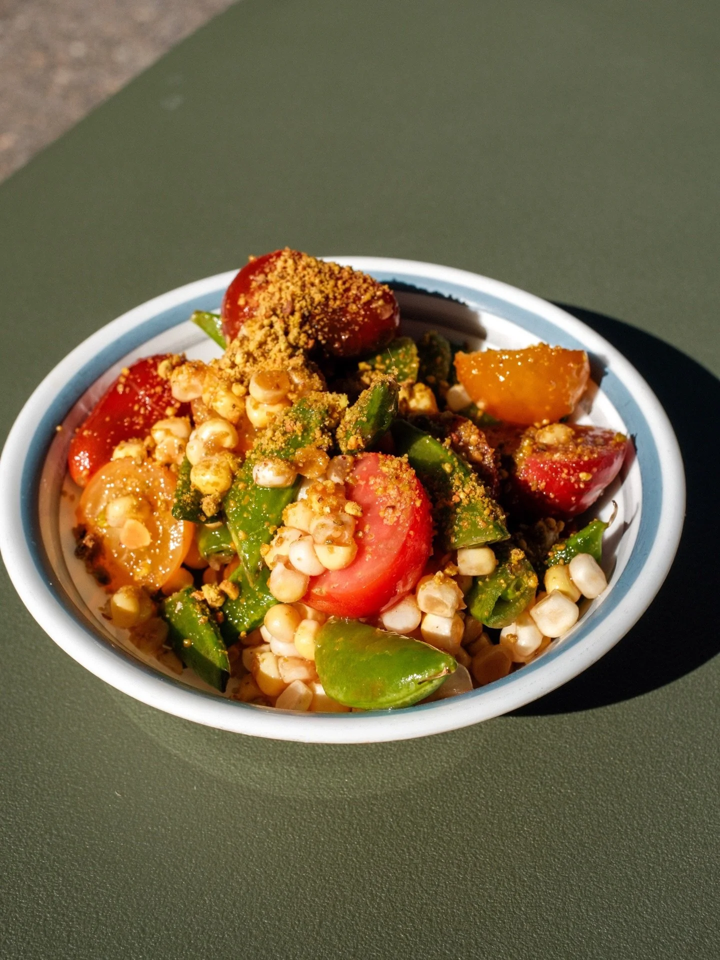 Korn, corn same-same. 
WA corn, heirloom cherry tomatoes, snap peas and pistachio with balsamic vinaigrette. Your new favorite seasonal side? And band? 
//
Shout out to @franksqualityproduce