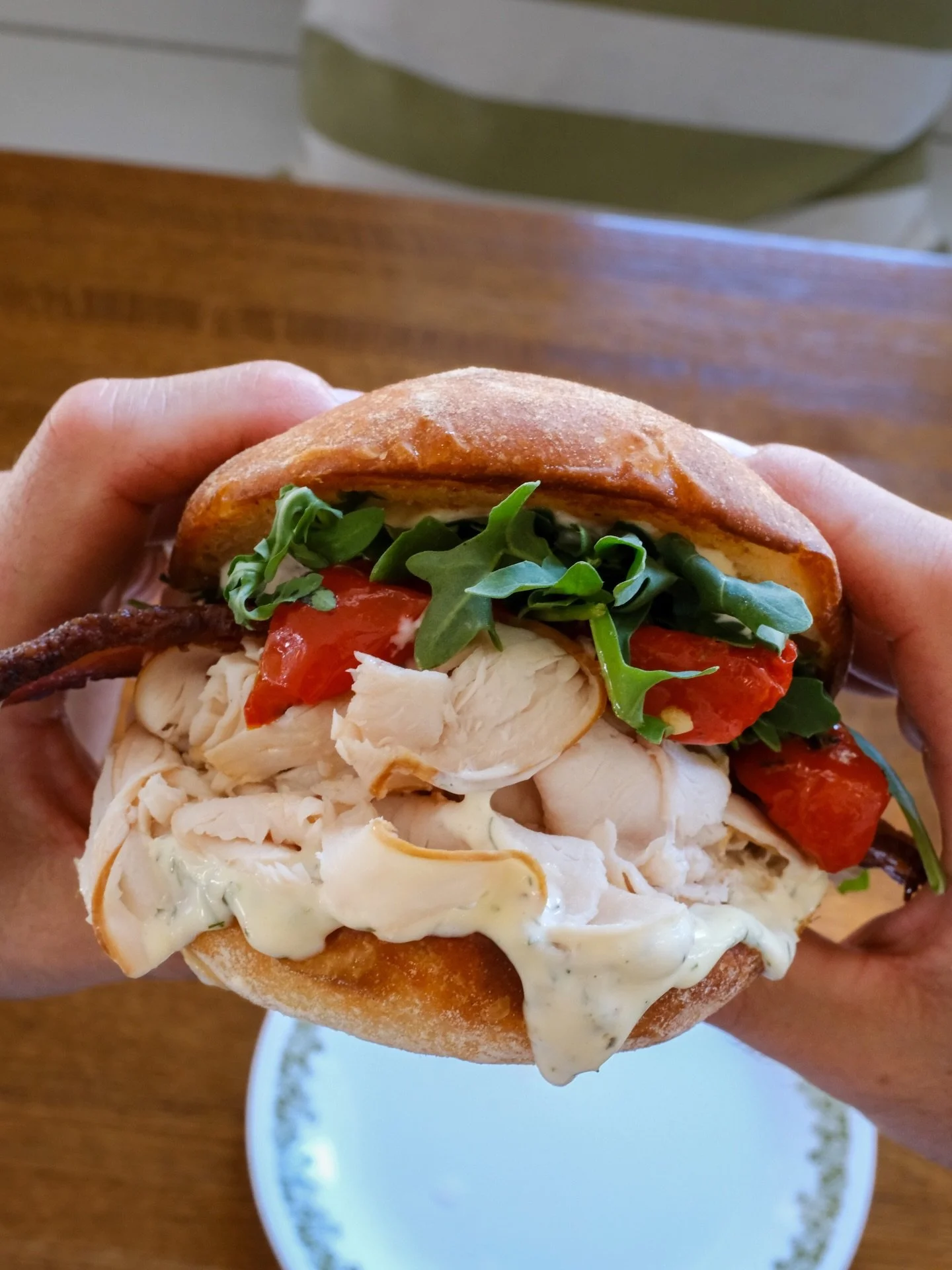Dreaming of a TBR? So are we. Refreshing to say the least, potentially better than a club, and dare we say the BLT&rsquo;s cousin. Smoked turkey, thick cut bacon, house dairy-free dilly ranch, marinated tomato and arugula on a toasted potato bun. Lun