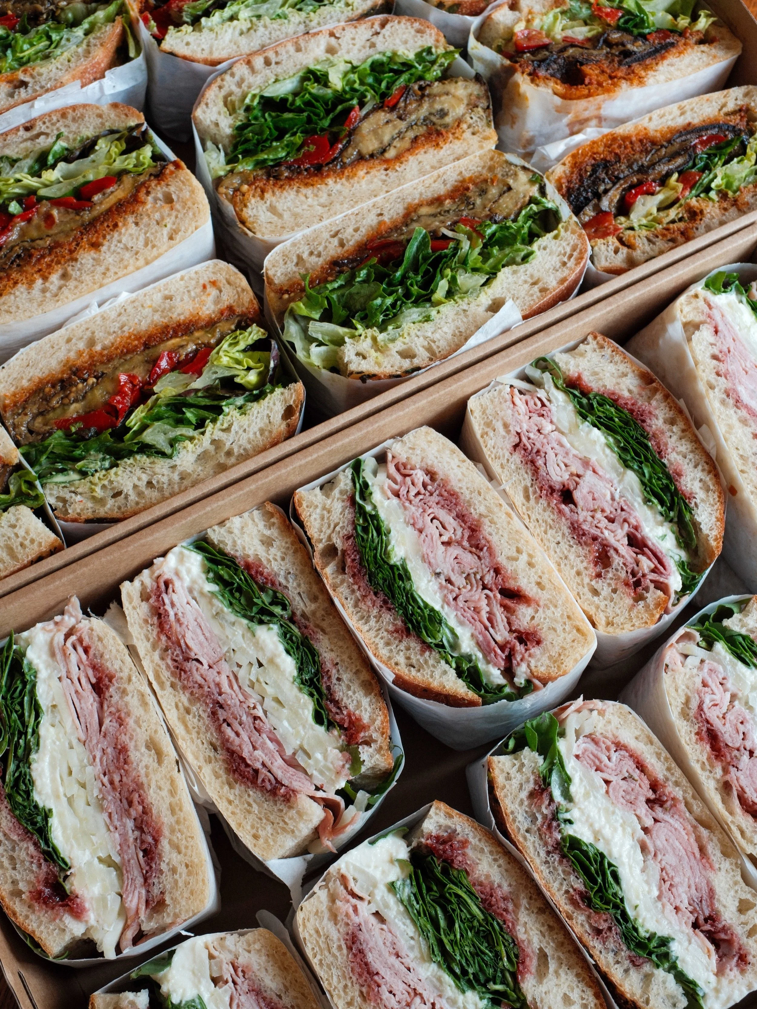 Fancy sandwiches, and something for everyone. Book the next team lunch meeting or special party with us!  Link in bio.