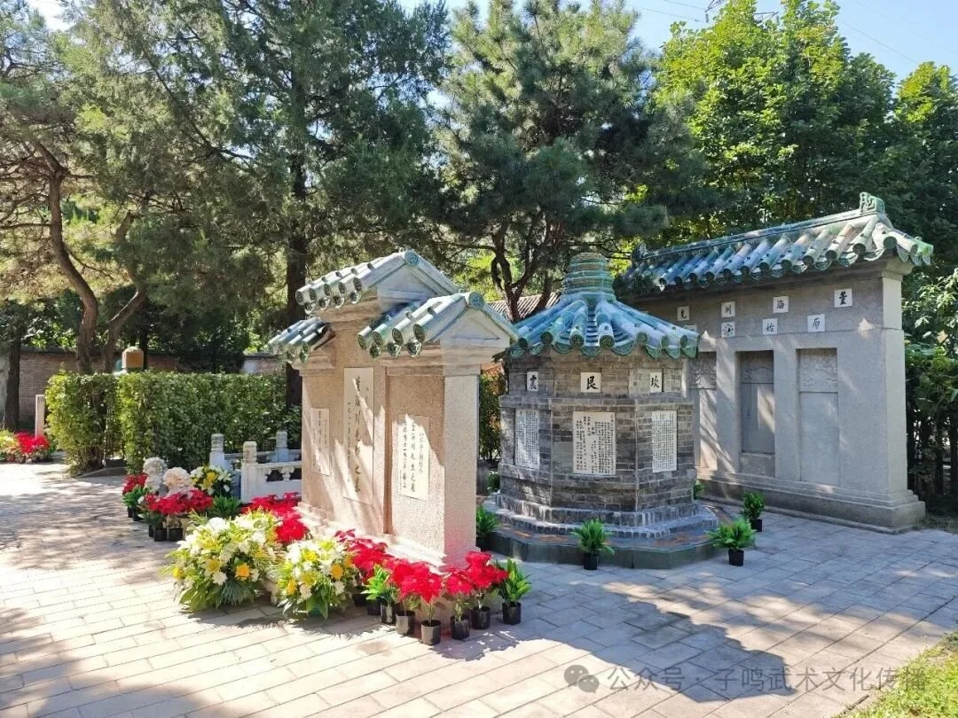 Restored tomb of Dong Haichuan at Wan’an Cemetery in Beijing, with flowers placed in front