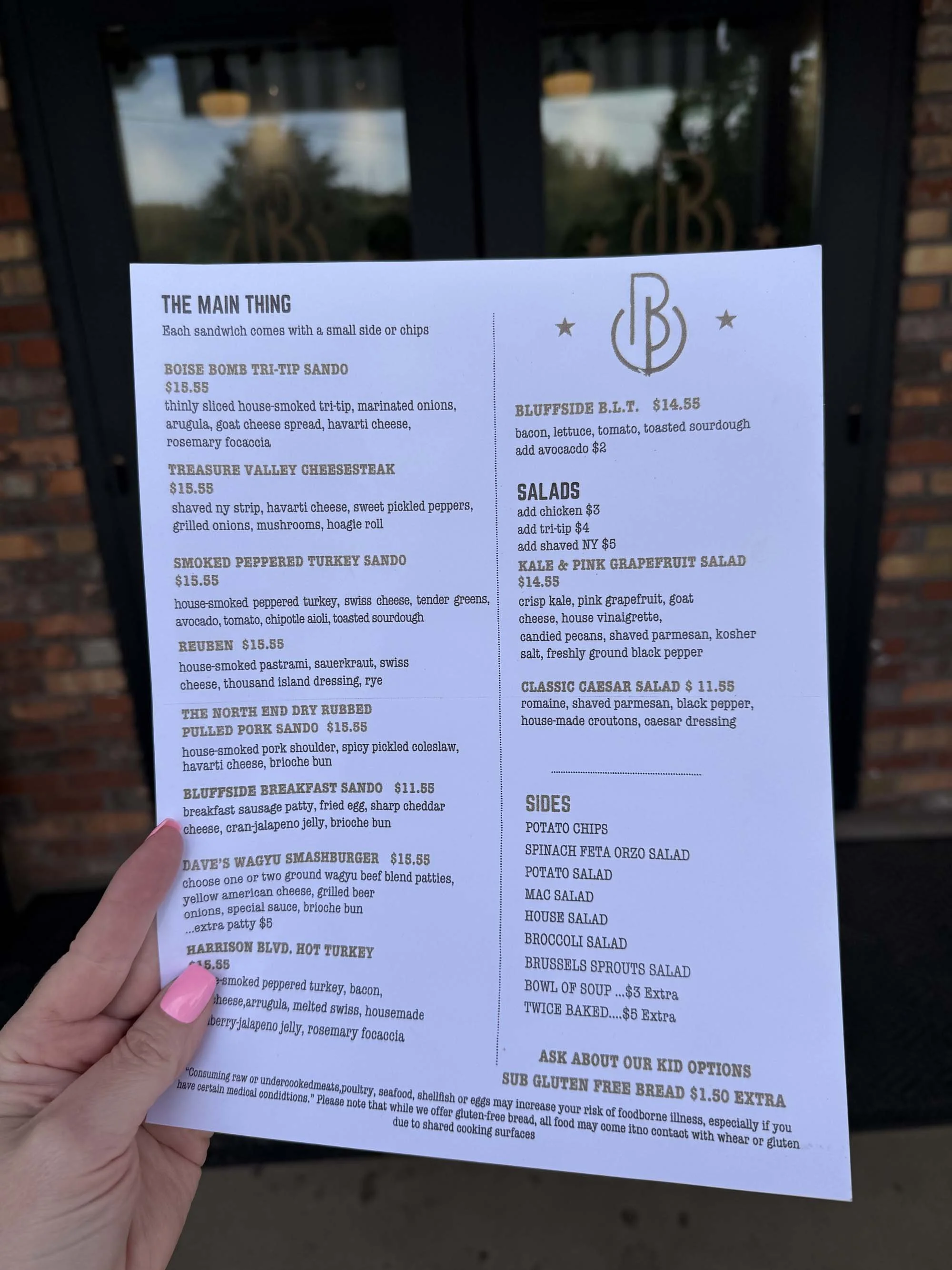 Bluffside Provisions and Butchery Boise Sandwich Shop and Desserts - Butcher with Meat for the bbq 9.jpg
