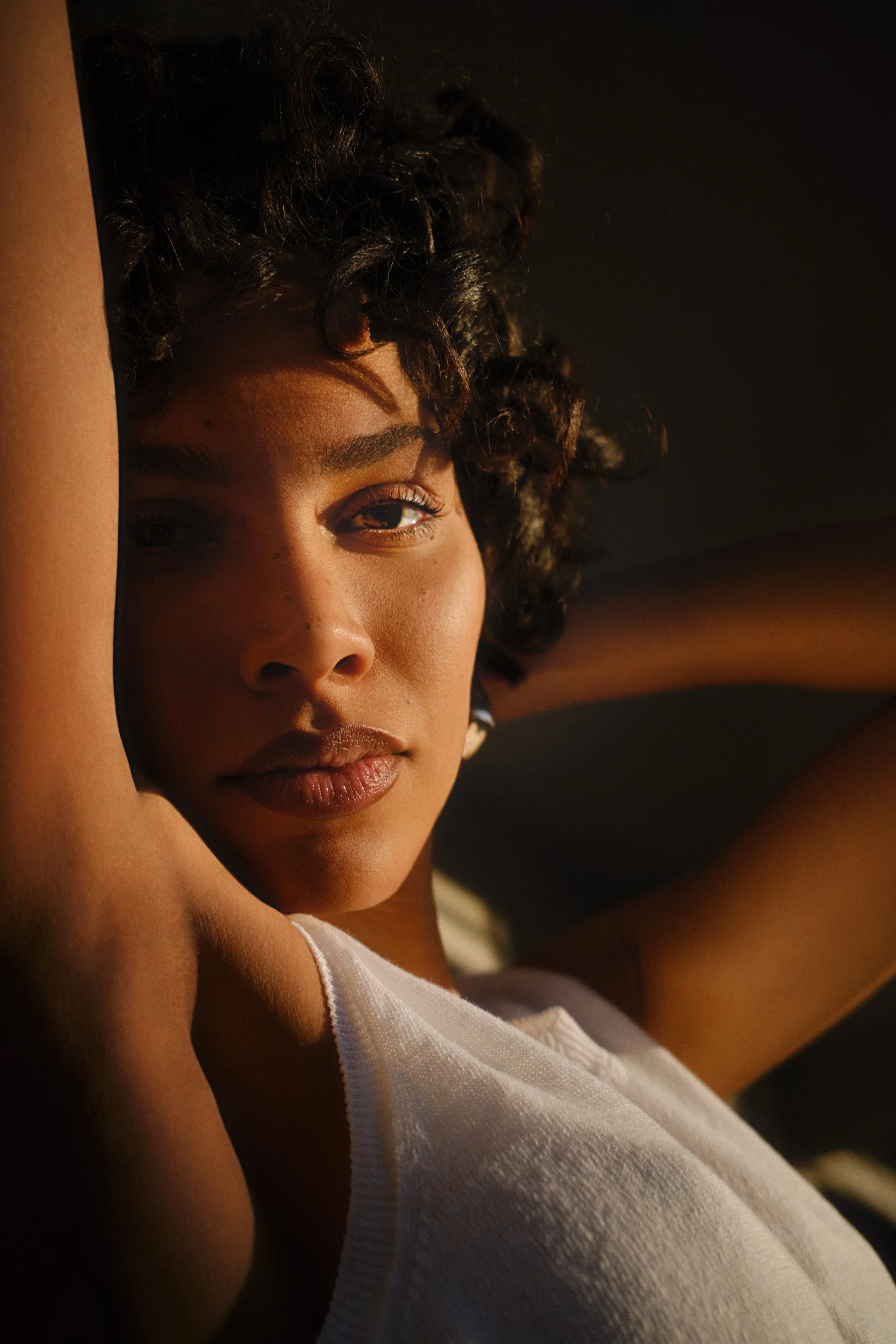 Automotive advertising image of woman on steps with Lancia Ypsilon. Automotive photography, CGI, retouching, postproduction, lifestyle