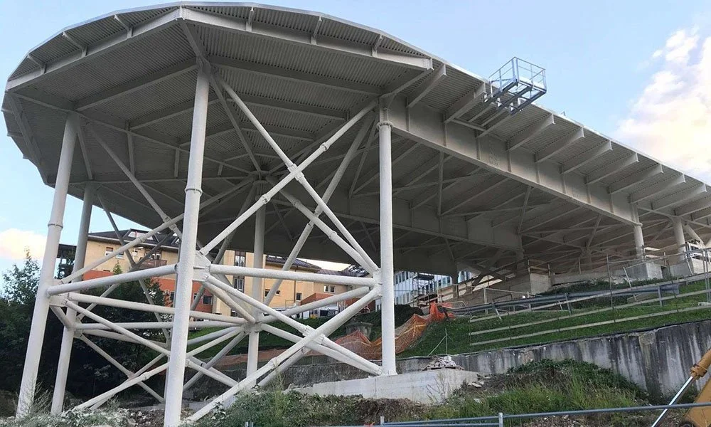 Structural steel structure protected with spray applied passive fire protection in Pieve di Cadore