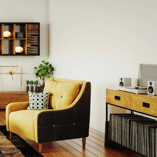 Stylish living room corner with armchair and console – Ramco Hilux calcium silicate board walls resistant to moisture and mould.