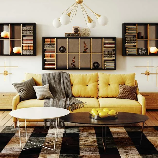 Contemporary lounge with yellow sofa and bookshelves – Ramco Hilux calcium silicate board interior providing fire safety and smooth finish.