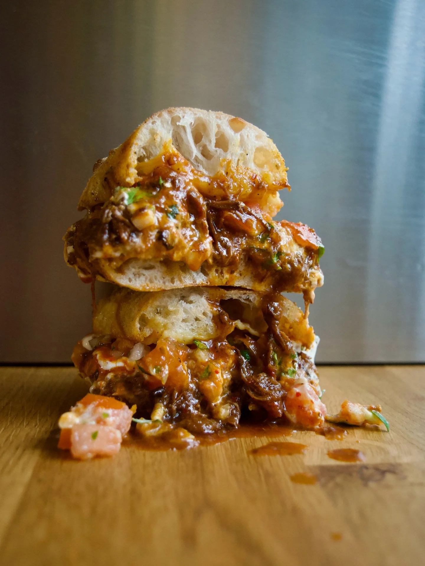 The Messy Birria returns.

Messy in name, messy in nature. It really needs a disclaimer. We are not responsible for your dry cleaning bill. God forbid you wear a white top.

Four types of dried Mexican chillies go into the deep, rich broth we braise 