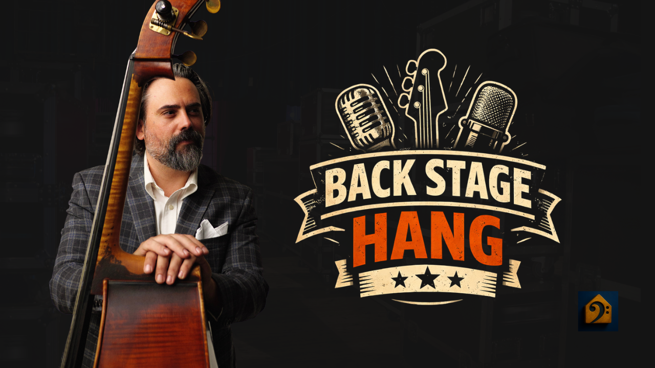 A man with a beard and mustache, dressed in a plaid blazer and white shirt, leaning on a double bass, with a backstage and music-themed graphic and text that says "Back Stage Hang" in the background.