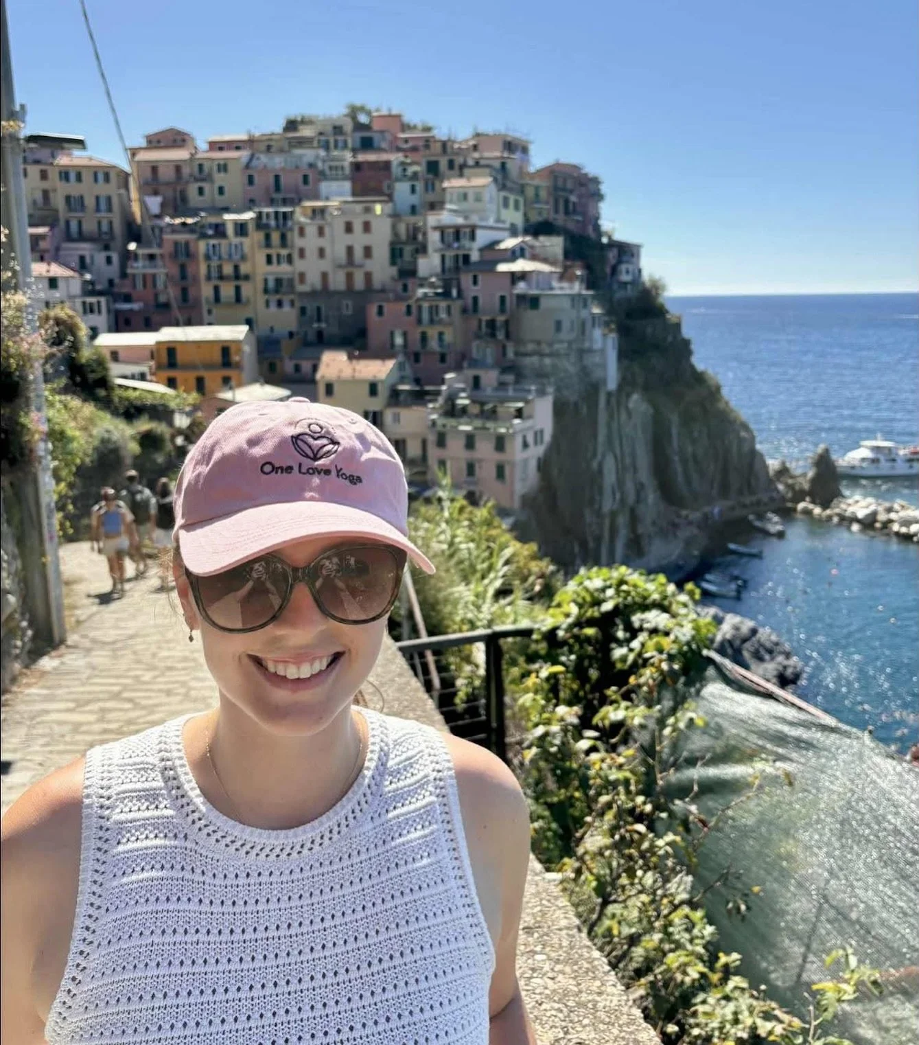 Spotted in the wild…Megan is in Cinque Terre, Italy on vacation! ๐ฎ๐น 
Thank you for spreading the โ๐ป๐ around the world. 
*๏ธโฃ if you have a picture in your gear and would like us to post it-please DM us! 
#oneloveyoga #oneloveyogaharrisbu