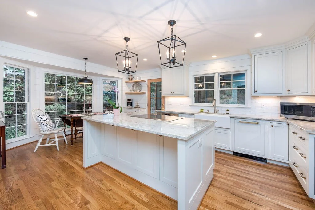 Bright kitchen with a large island and detailed cabinetry