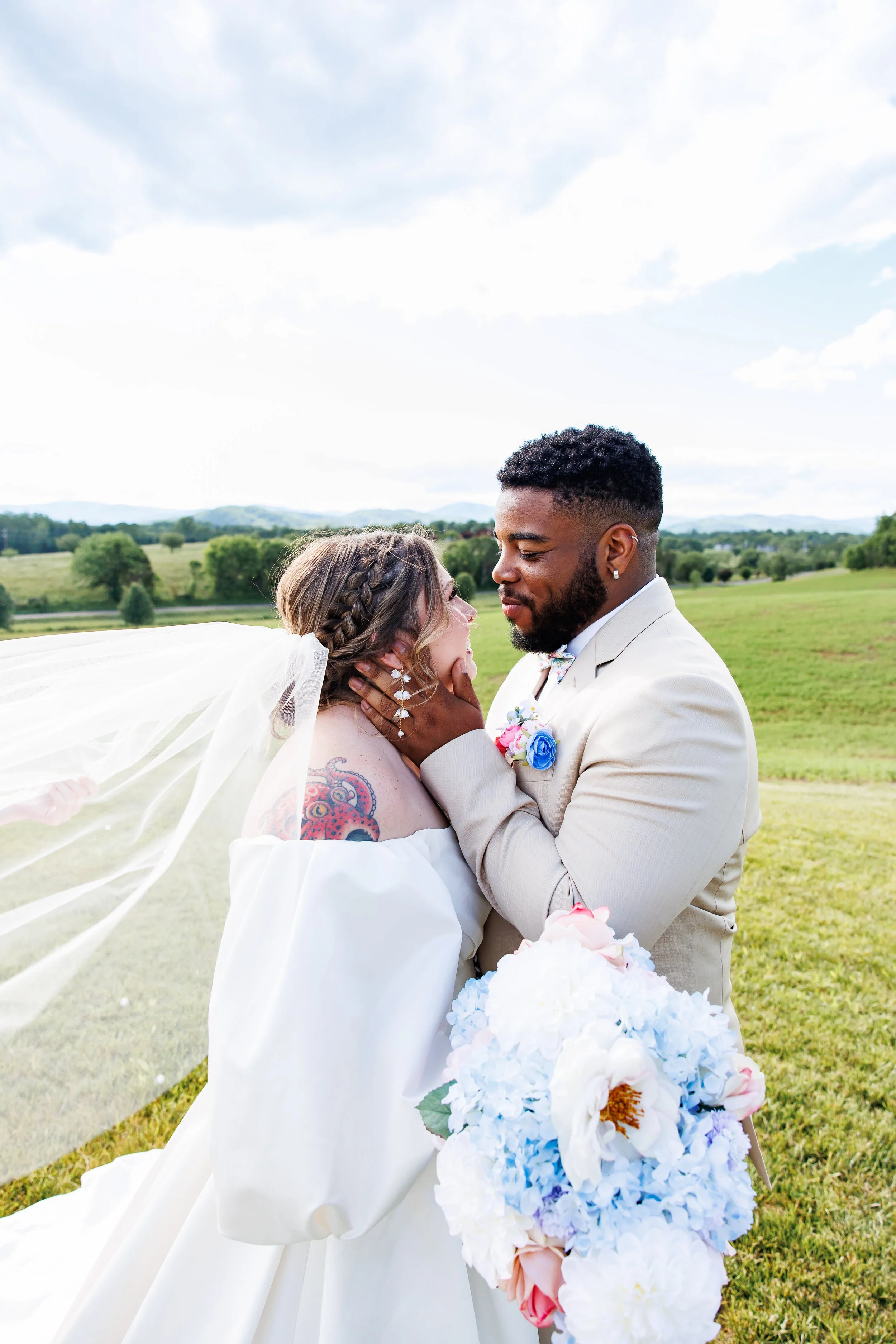 interracial couple staring into each other's eyes lovingly