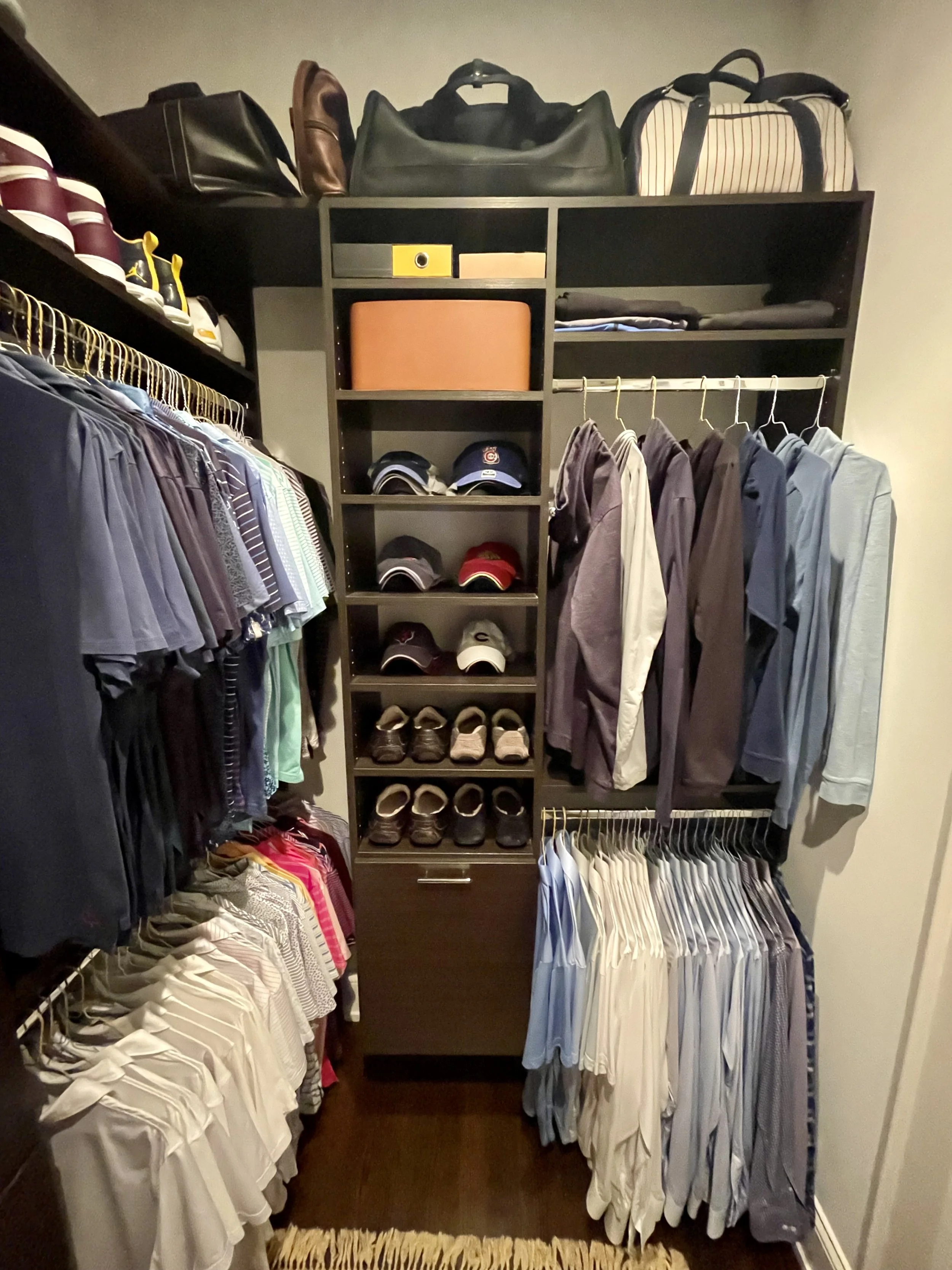 Professional Home Organizer in Chicago. Men's primary closet after organizing.