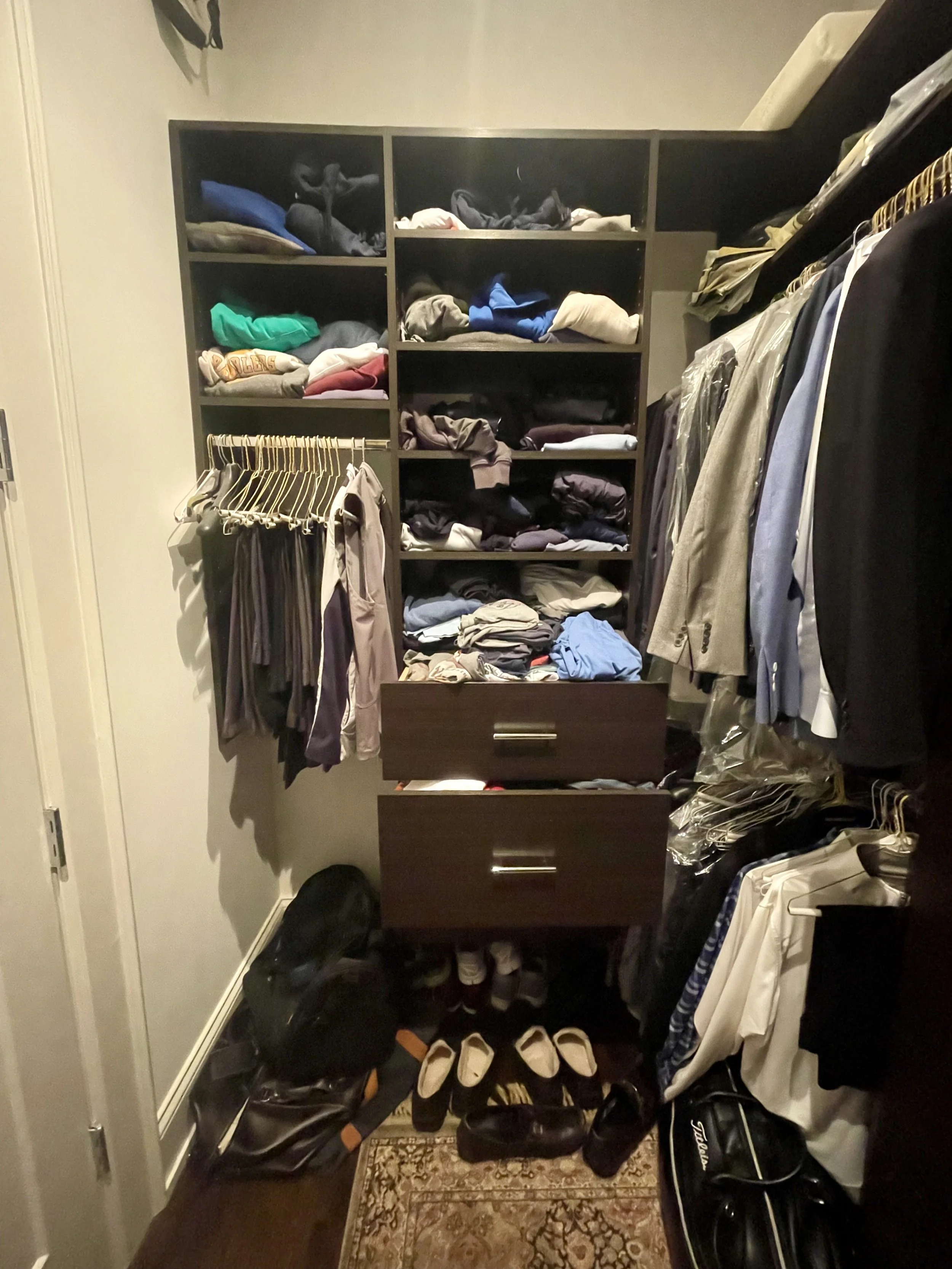Professional Home Organizer in Chicago. Men's primary closet before organizing.
