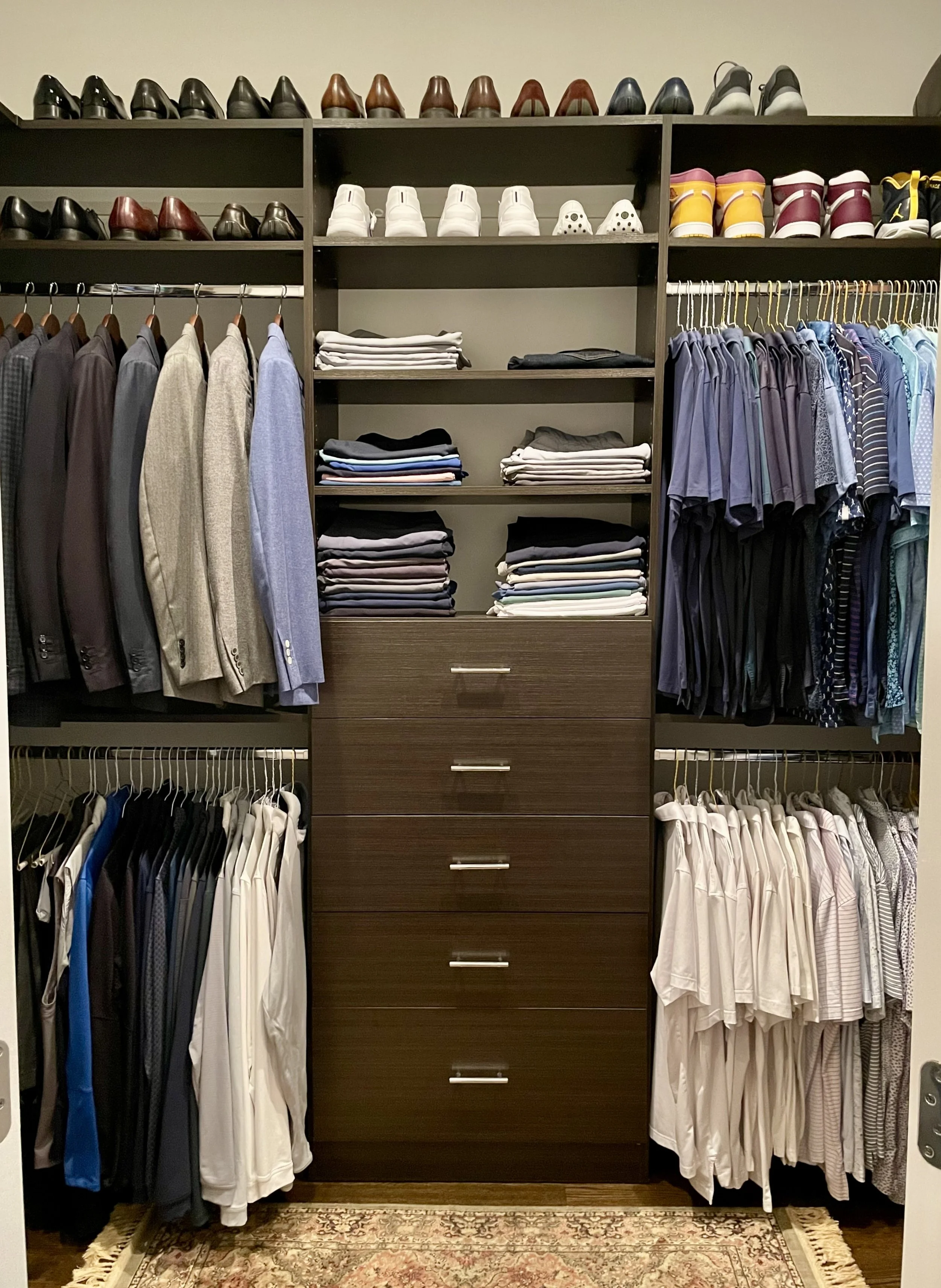 Professional Home Organizer in Chicago. Men's primary closet after organizing.