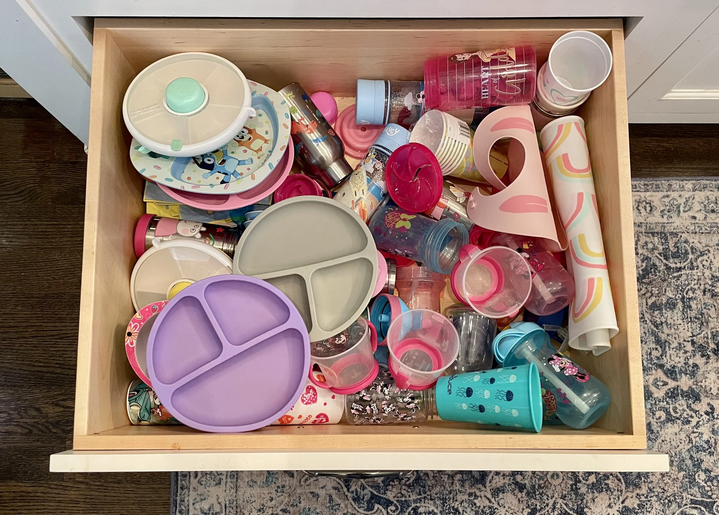Professional Home Organizer in Chicago. Kitchen pantry drawers before organizing.