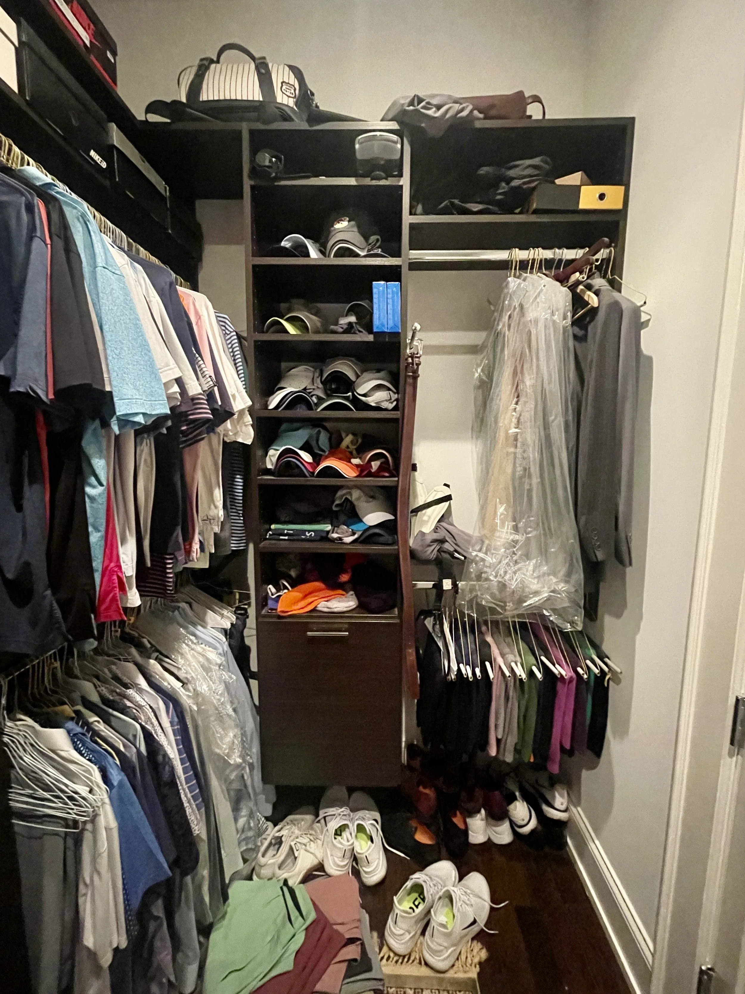 Professional Home Organizer in Chicago. Men's primary closet before organizing.