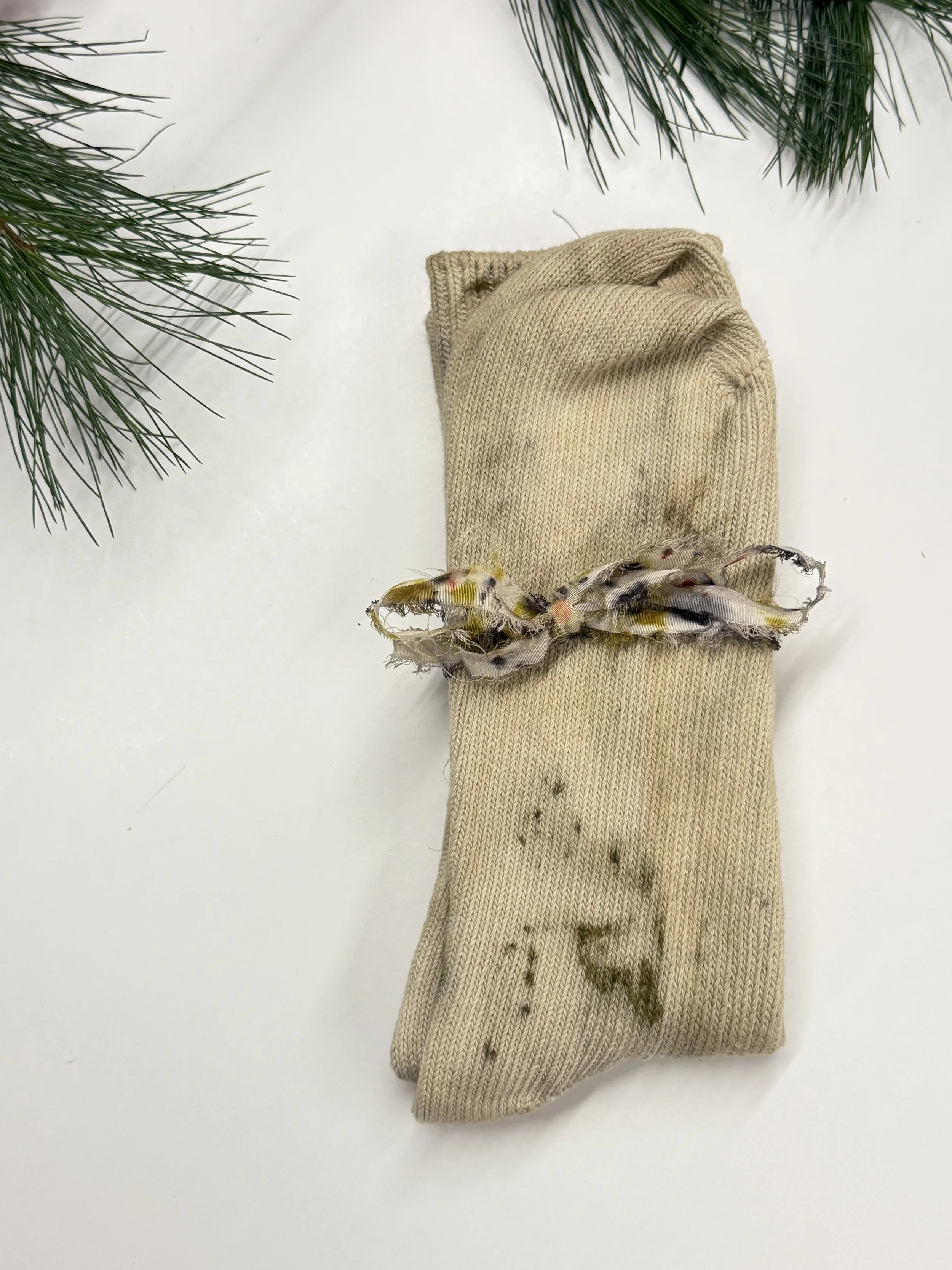 light print of leaves and flowers on cotton socks.JPG