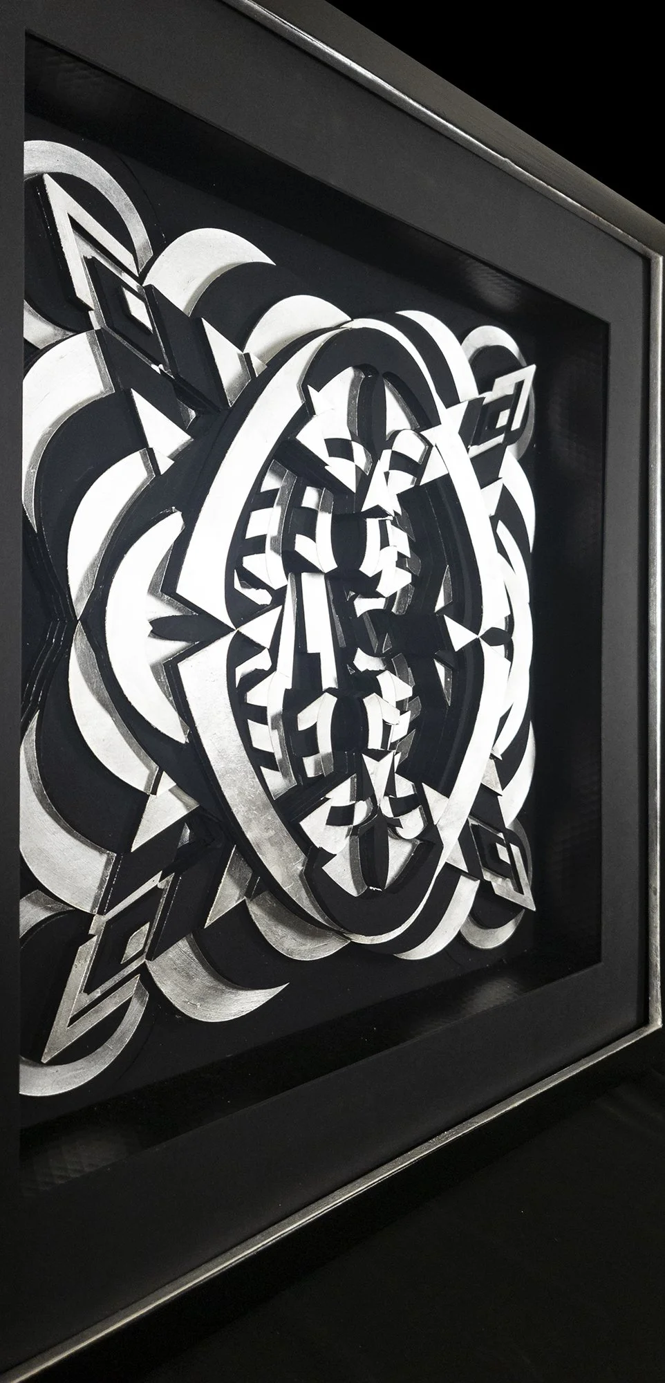 Jason_Amatangelo_Immortals Silver_2023_Sterling Silver leaf on paper with closed cell foam for construction_31x31x3_Angle3.jpg