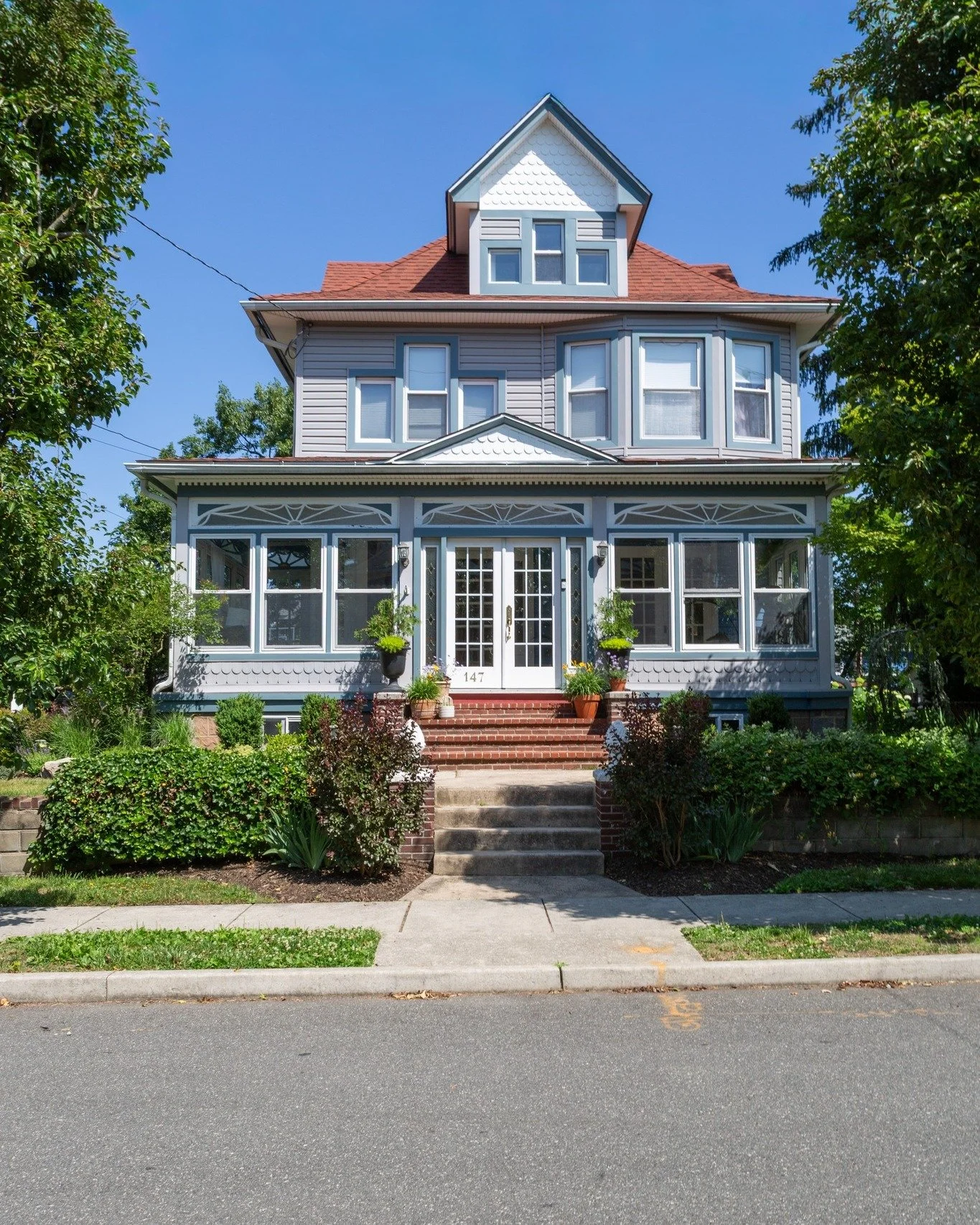Step inside a piece of history that has only changed hands three times since 1900. Now owned by Liza and Nick Giorgio, this home features an opened-up layout that lets the light flood in, revealing stunning two-toned Celtic wood floors and historic g
