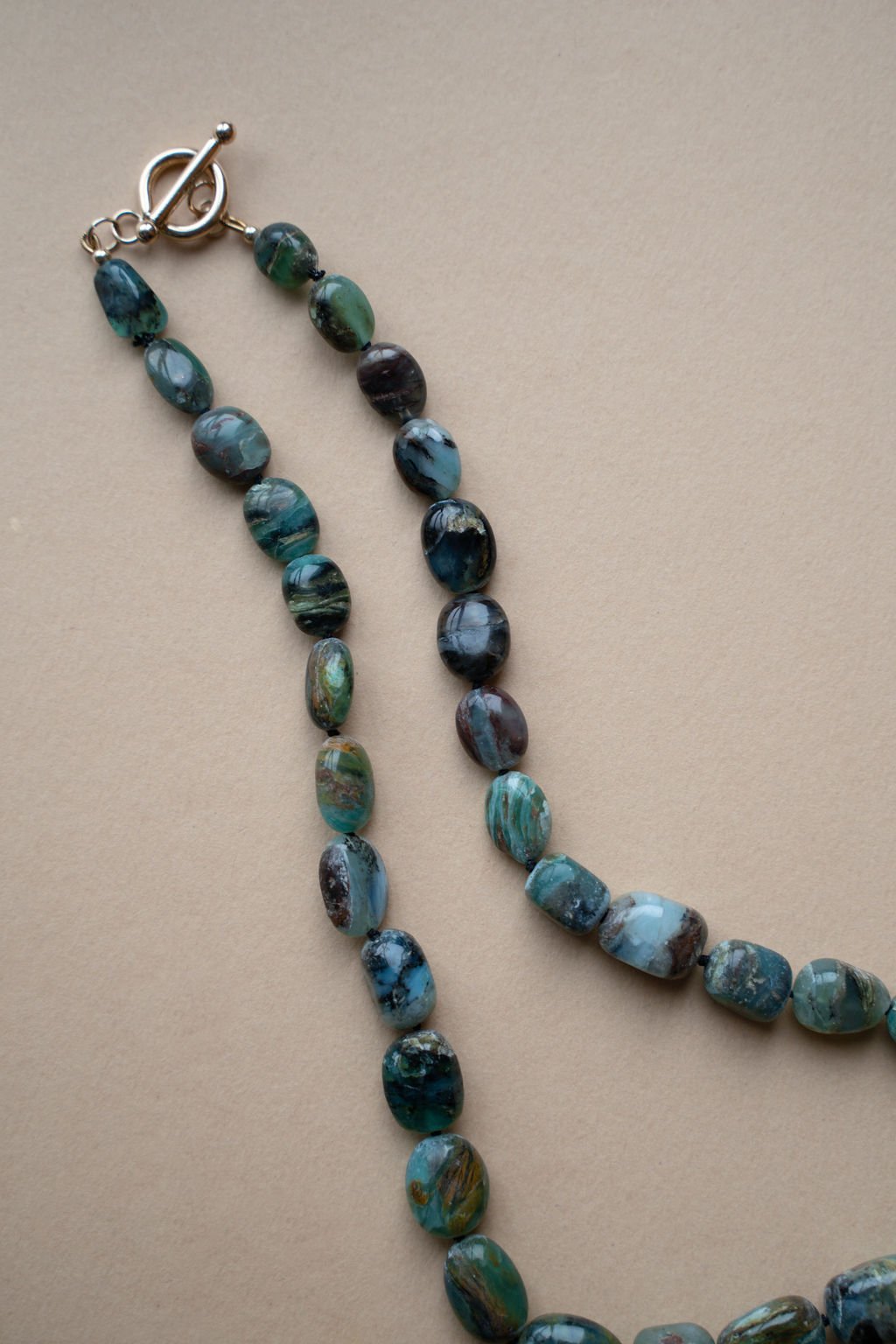 19(1) peruvian blue opal with matrix bead.jpg