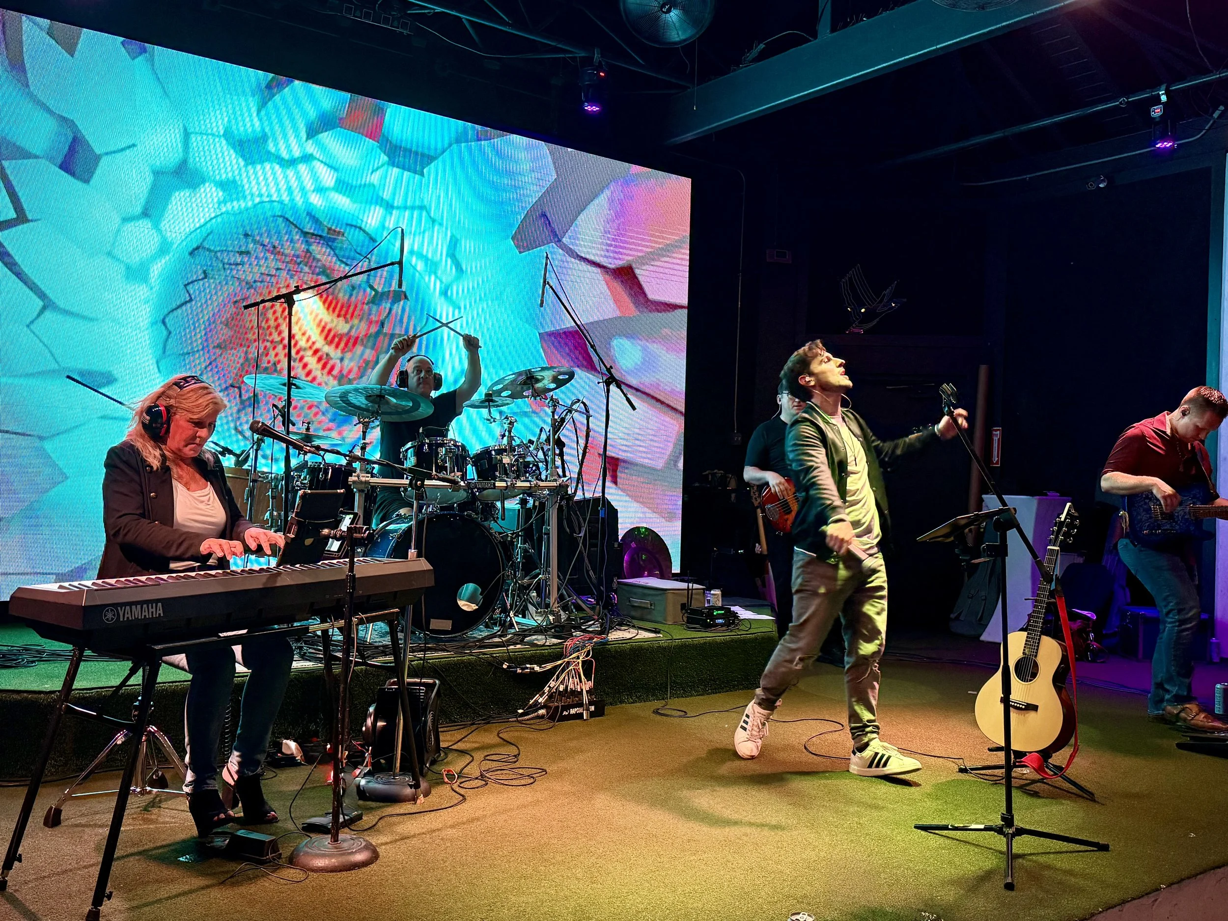 LIT LIVE WITH BACKGROUND VID.jpeg