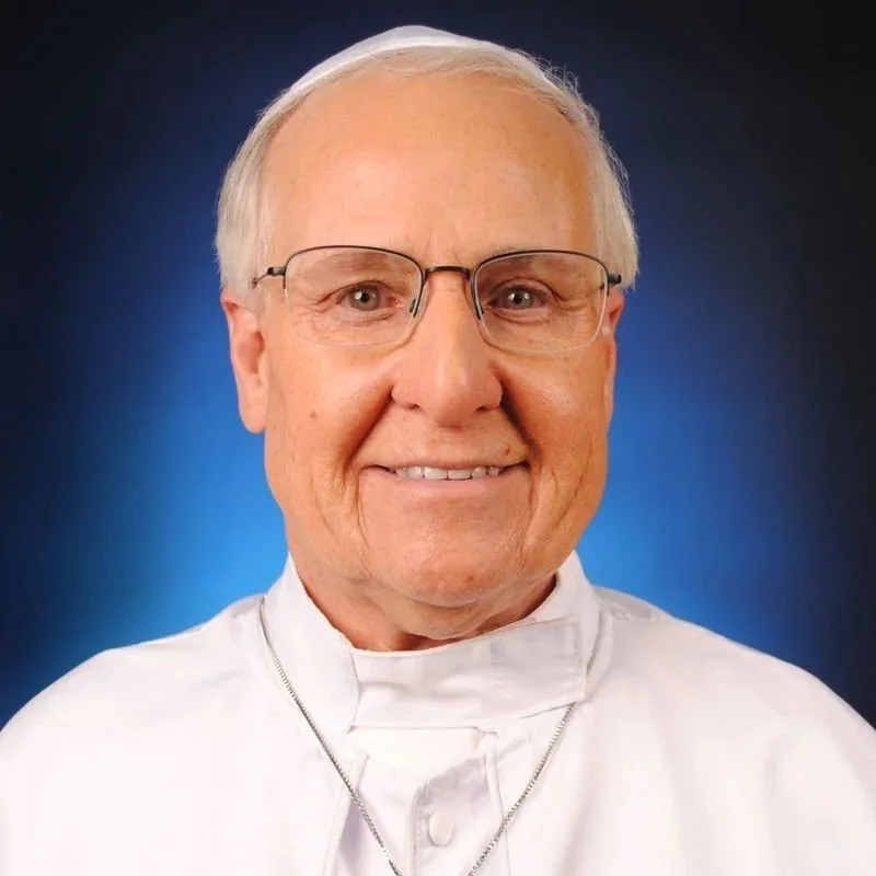 Pope lookalike in traditional white papal attire