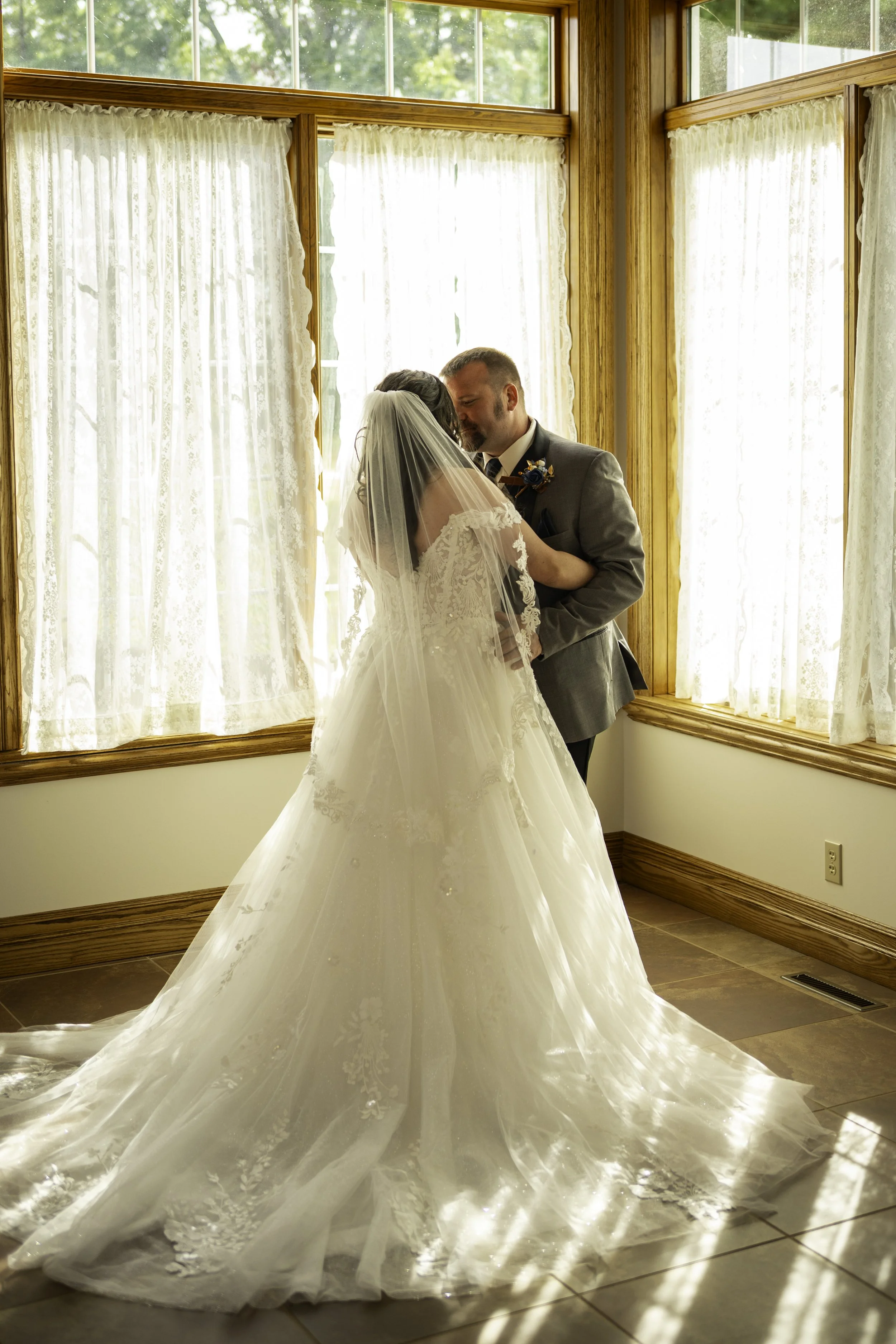 Bride-Groom in Great Room - Jody Mayne.jpg
