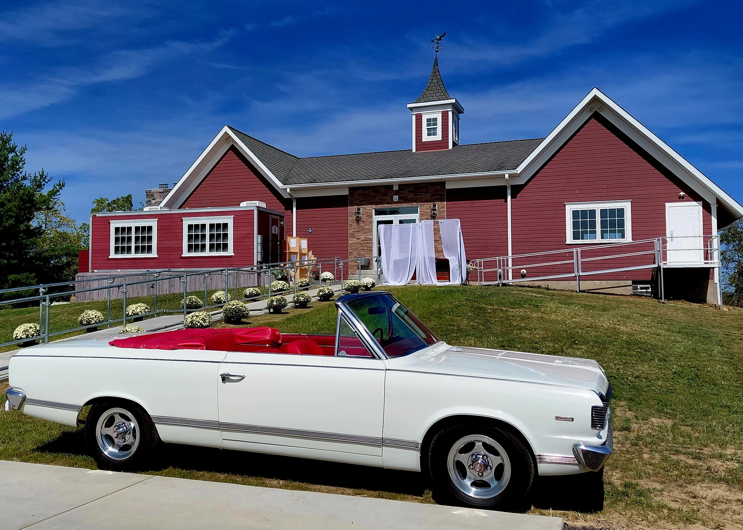 outside of venue with car - Jody Mayne.jpg