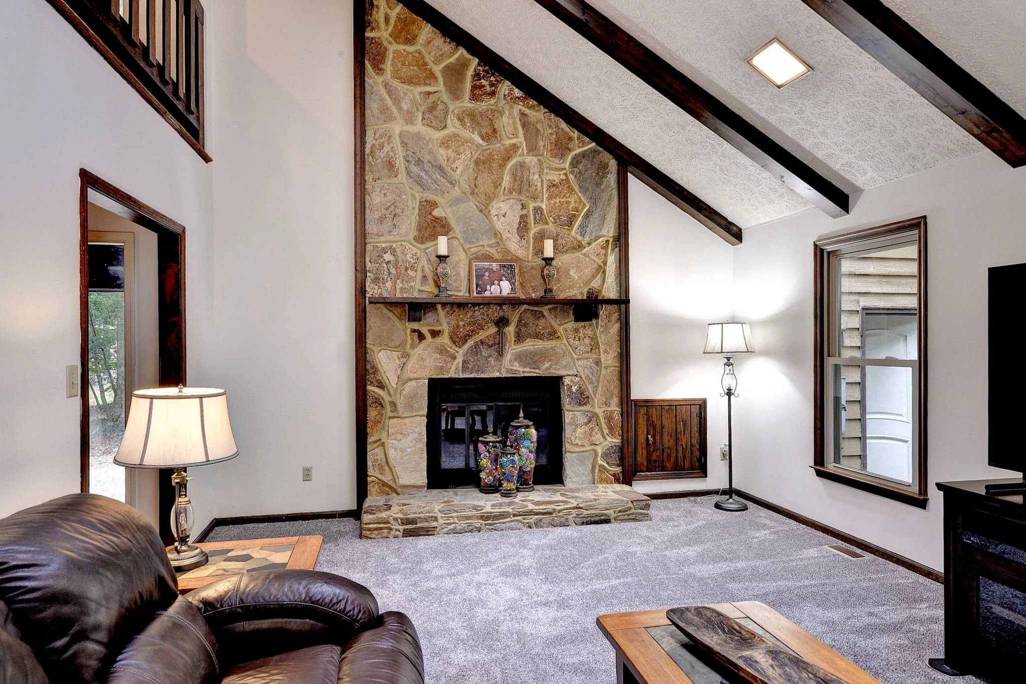 Living Room with Fieldstone Fireplace
