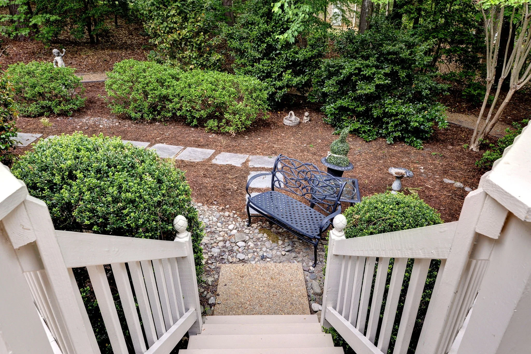 Deck steps down to Gardens