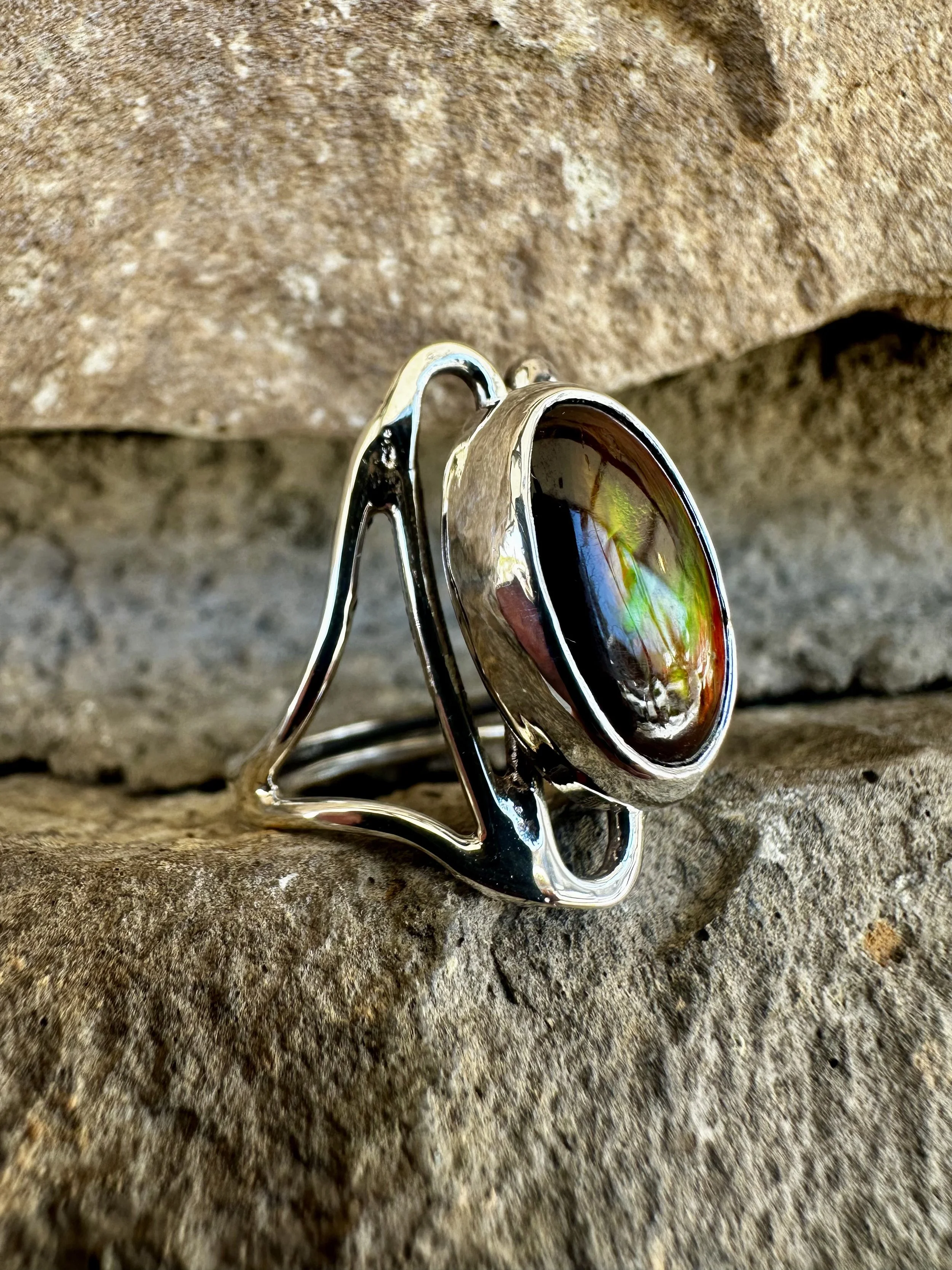 Handcrafted ring including natural Mexican fire opal and repurposed sterling silver.