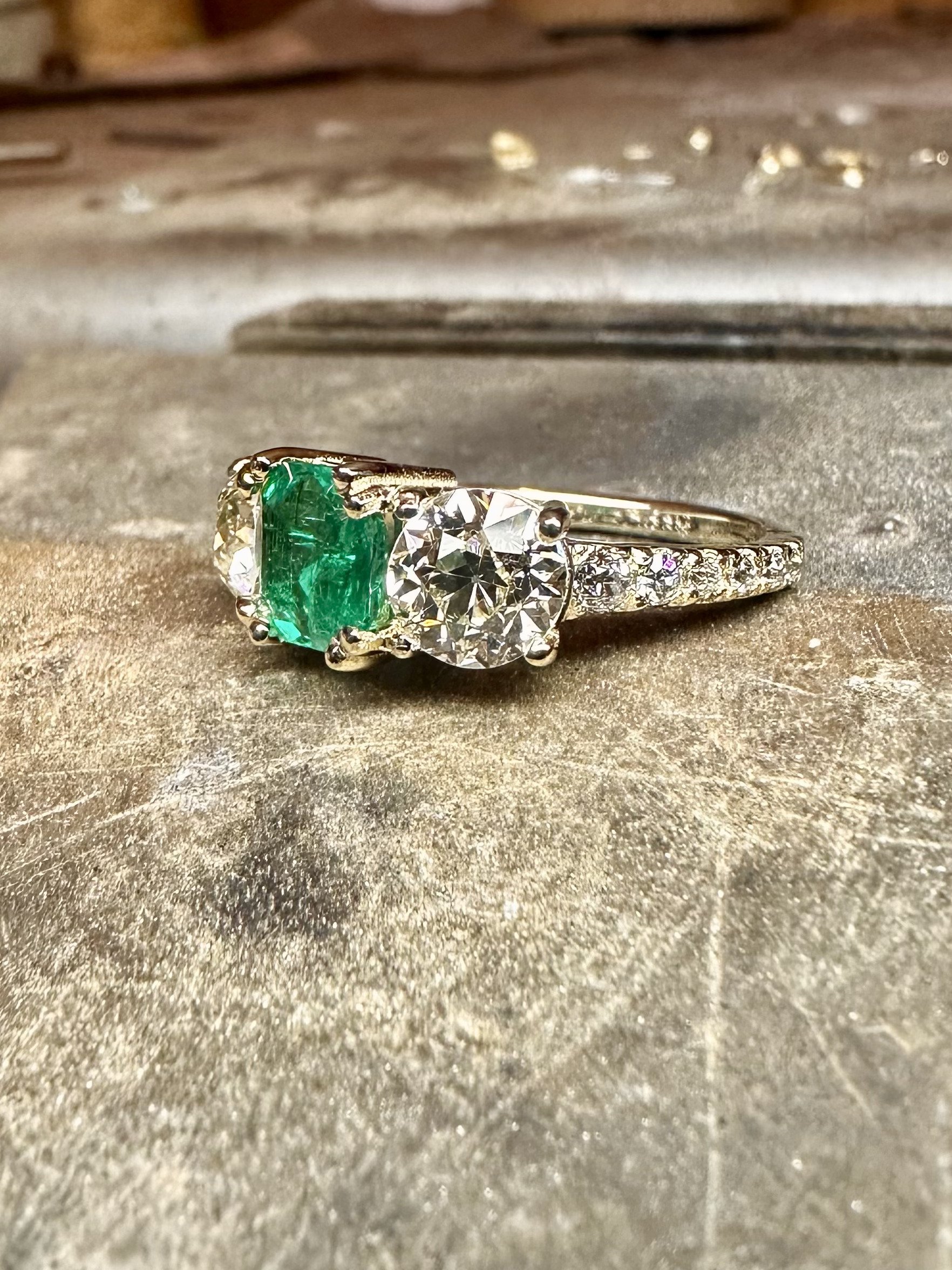 CAD designed 14 karat gold ring including client's family heirloom gemstones.