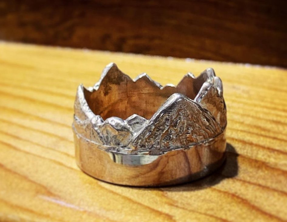 Handmade organic mountain range band using repurposed sterling silver.