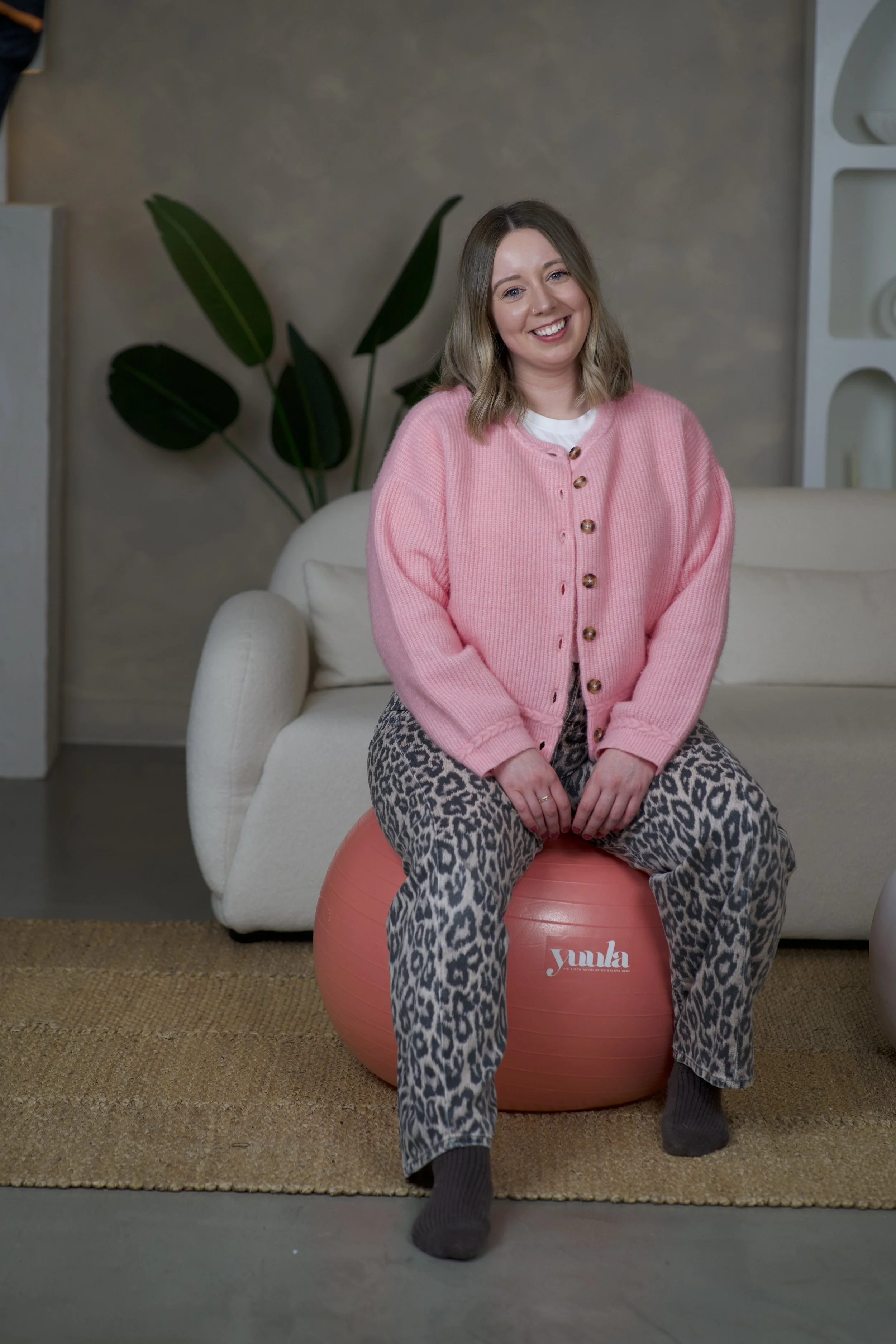 an online antenatal class teahcer, holly richardson, using a birth ball