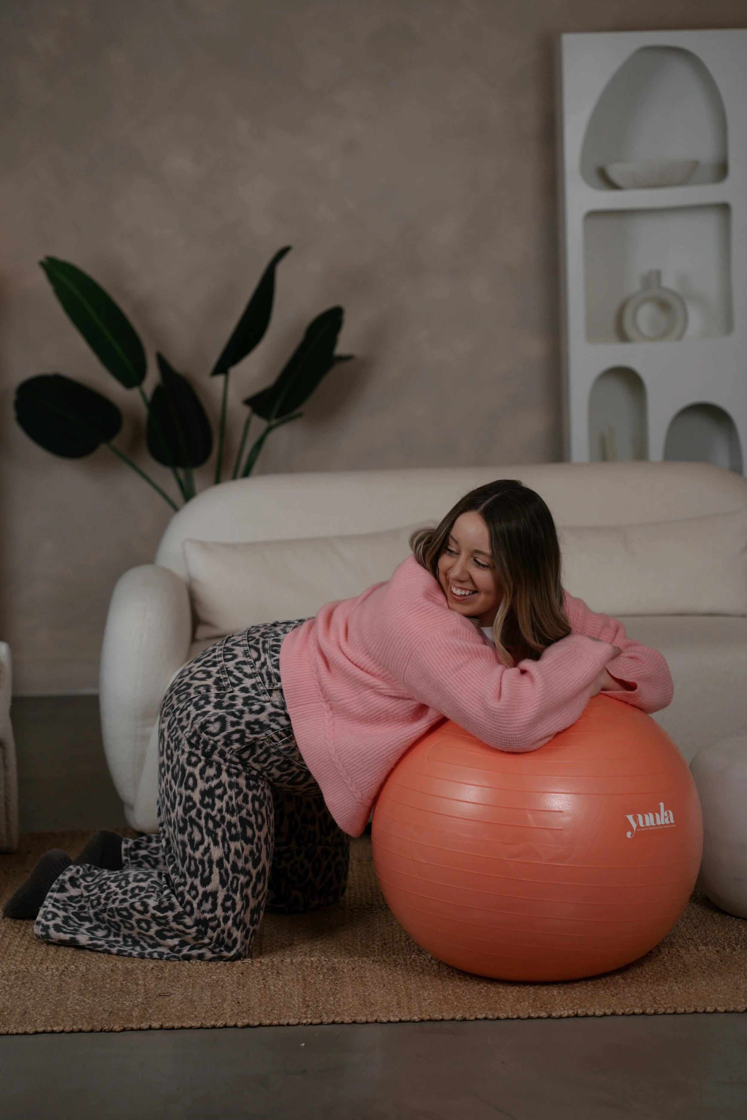 A hypnobirthing teacher in North Tyneside showing how to use a birth ball