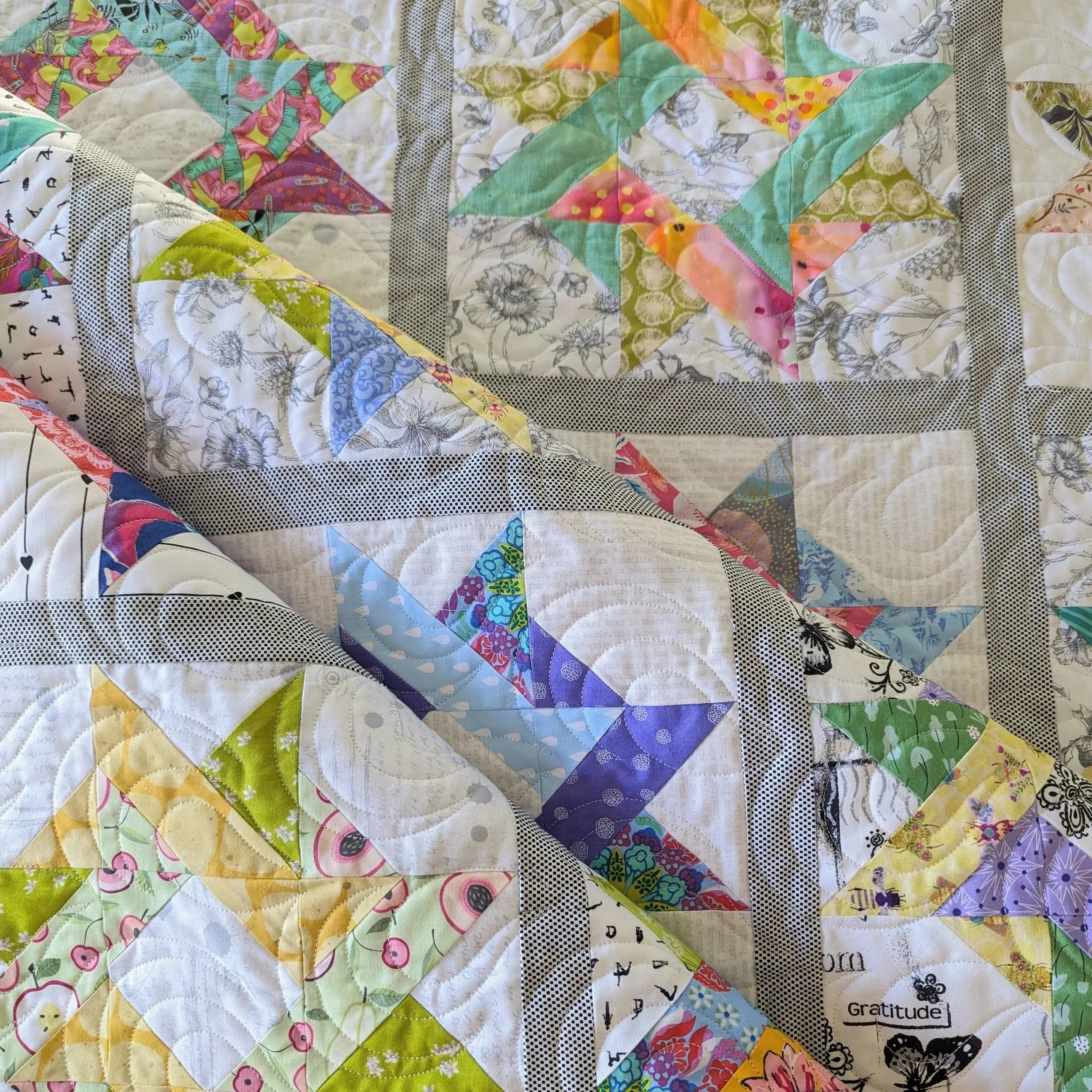 coquina+panto+on+layered+stars+quilt.jpg