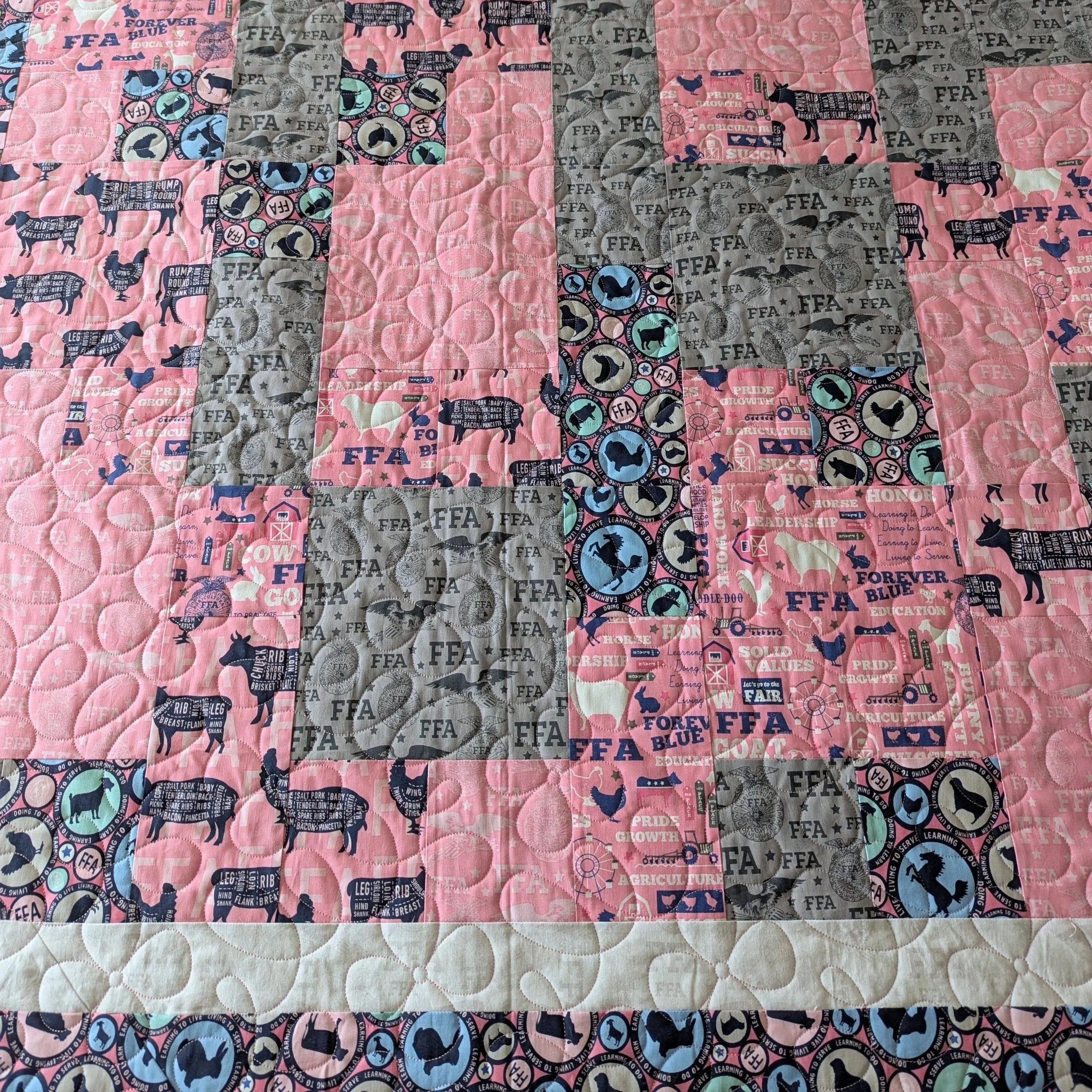 petal+twirl+panto+on+pink+ffa+quilt.jpg