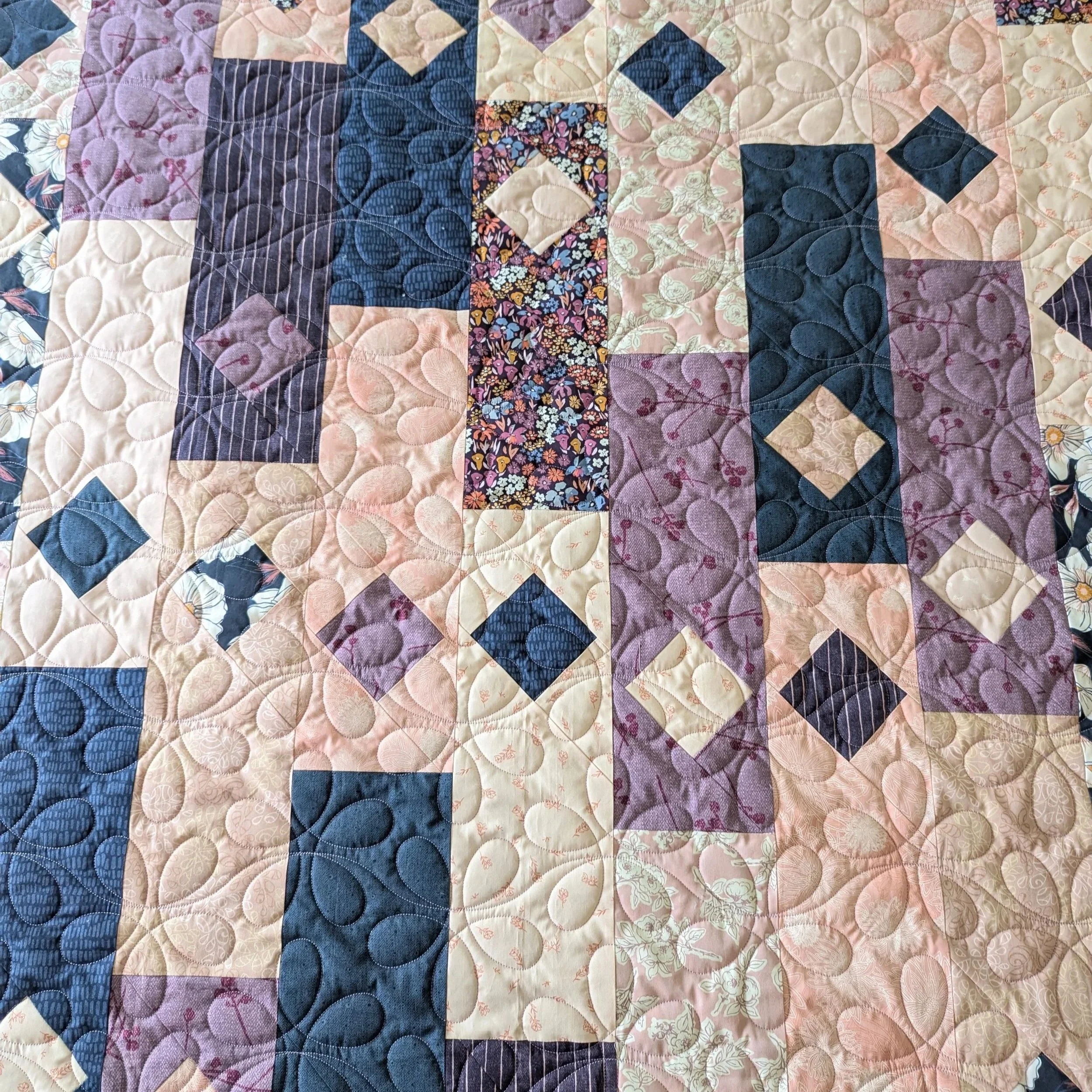 flower+child+panto+on+pink+and+blue+quilt.jpg