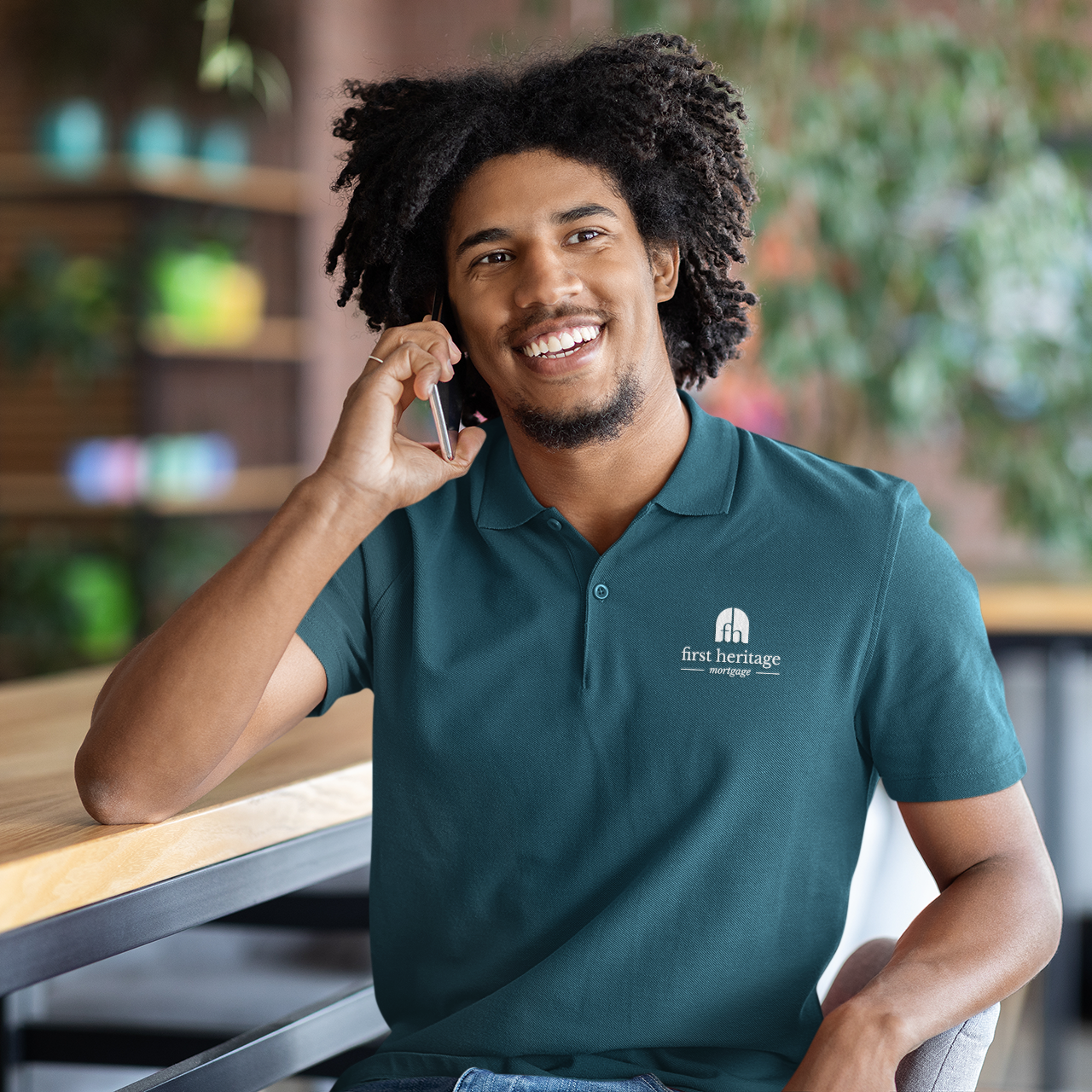polo-shirt-mockup-of-a-man-with-an-afro-hairstyle-talking-on-his-smartphone-m19354-r-el2.png