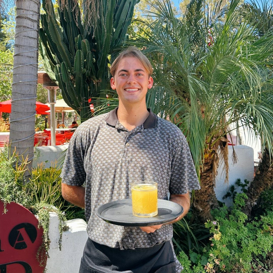 Meet Spencer! He's been with us since June of 2022 and has since worked up from support staff to server. His favorite cocktail on our cocktail list is the Antidote. Swipe to read more about Spencer! ➡️