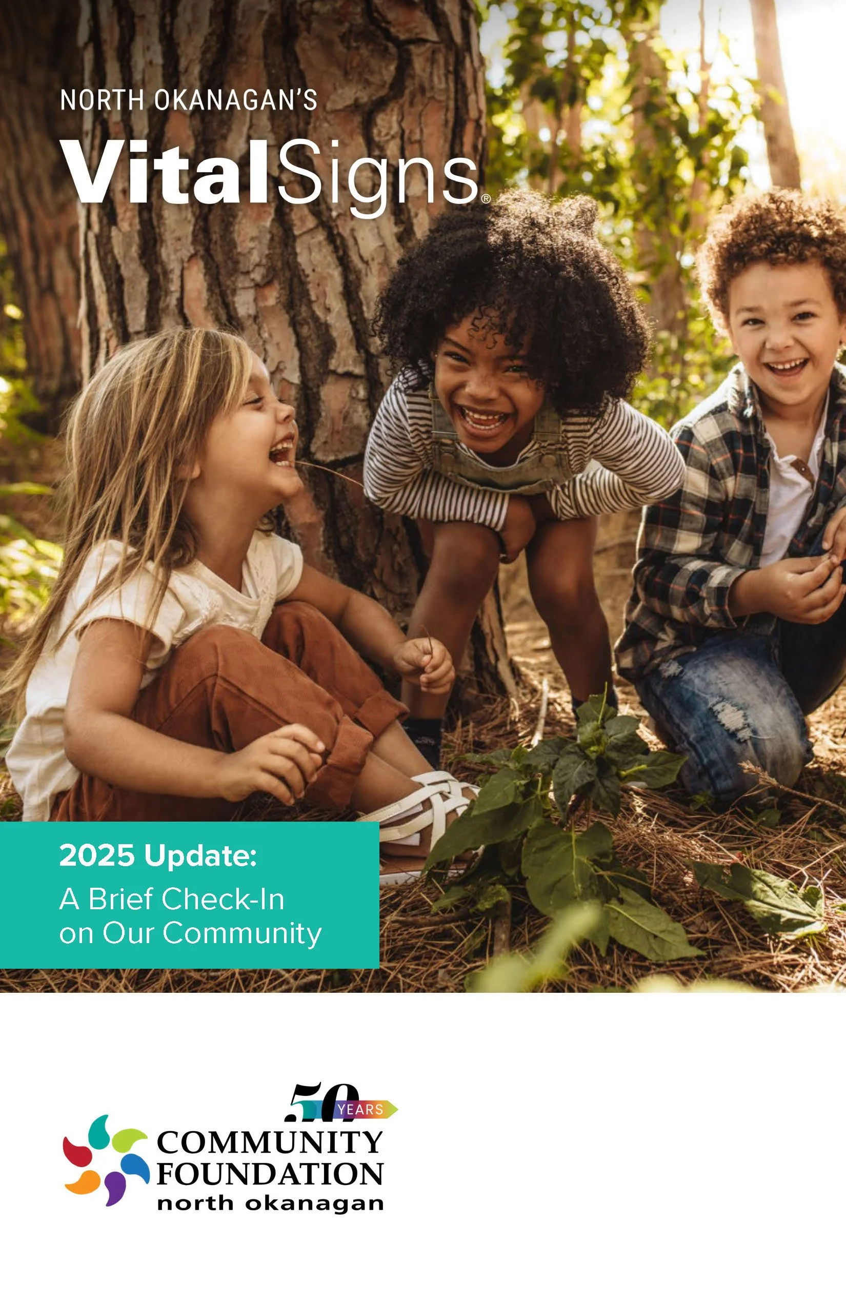 Report cover kids in forest laughing