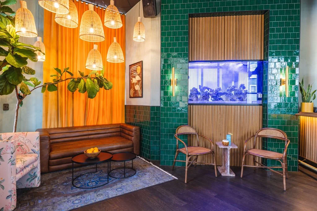 Architectural and interior photography of Emerald Lounge, a stylish restaurant and bar in Richmond, VA. Featuring moody lighting, lush textures, and refined design elements, this shoot highlights the lounge’s unique ambiance, elevated decor.