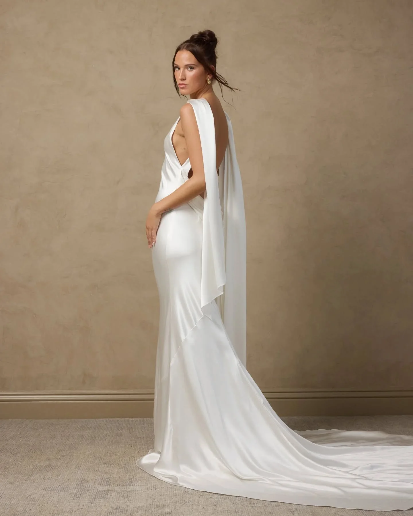 ✨ Meet Vale ✨
An elegantly understated gown for the modern minimalist bride. Bias-cut silk drapes effortlessly, featuring a plunging open back, soft draped hem, and chic scarf detail that evokes old Hollywood glamour 🤍

The Vale gown will be visitin