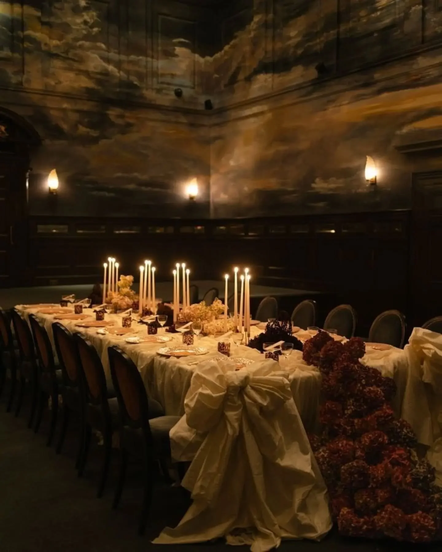 Candlelight, crushed velvet, deep wine tones &amp; a little bit of drama 🍷🕯️ #EverlyInspo

For the bride who wants her wedding to feel less traditional fairytale and more decadent late-night romance &mdash; theatrical details, overflowing tables, v