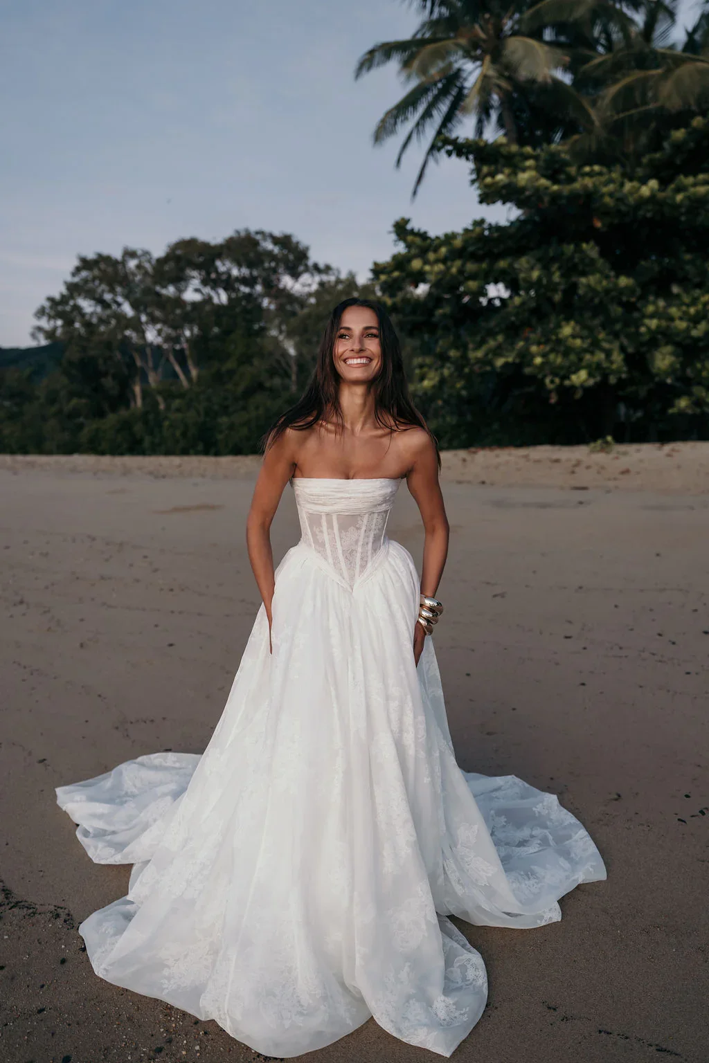 A modern silhouette meets timeless romance in Jacaranda, crafted from printed pure silk organza.
