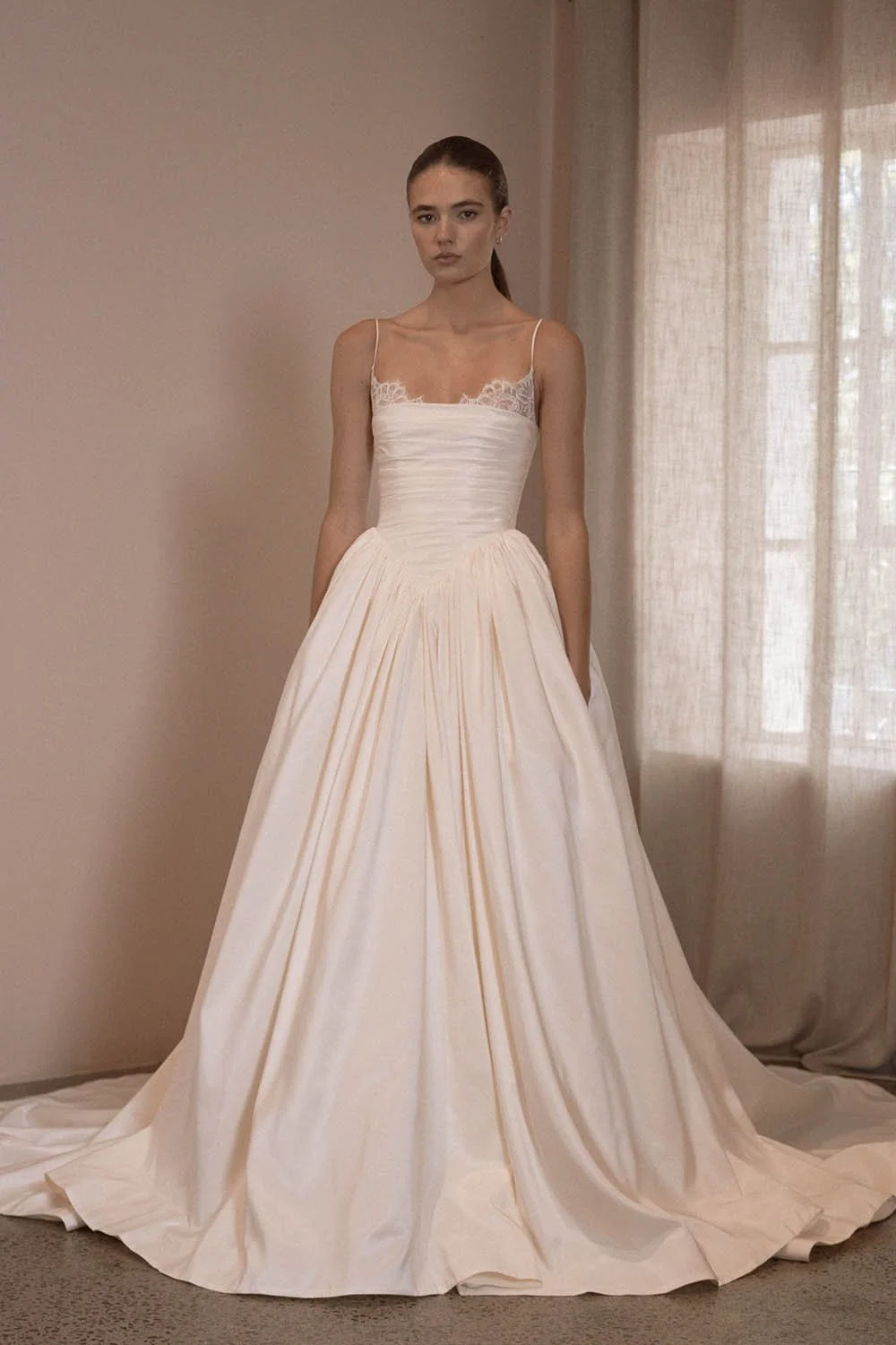 Vagabond Bridal wedding gown from the Paradis Collection featured for the Studio Collection Showcase at Everly Bridal. The gown showcases sculptural corsetry, architectural lines, and a modern romantic silhouette.