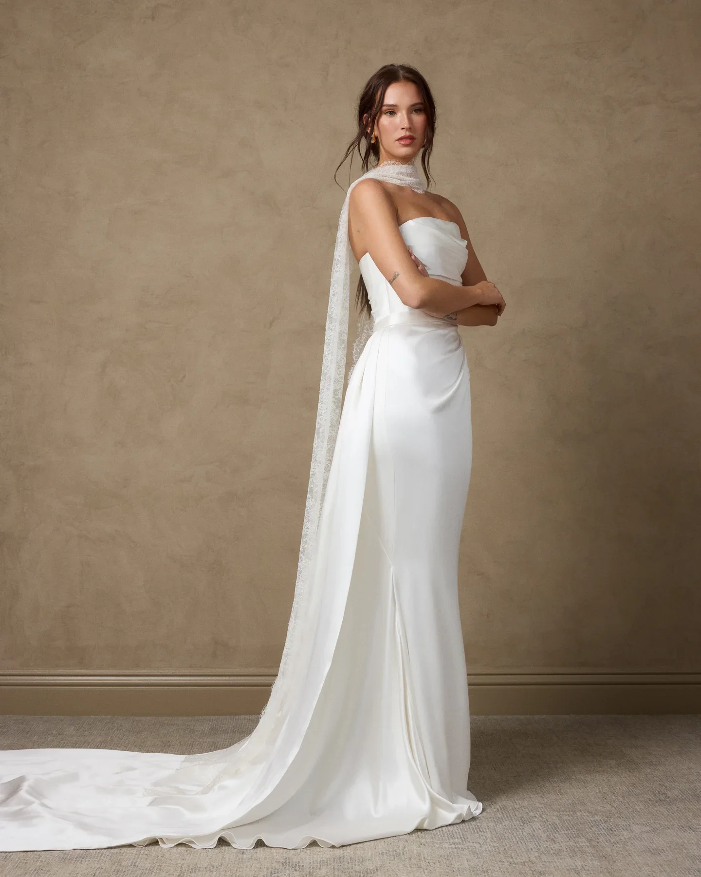 Harper dress, satin silk crepe gown with a high curved neckline and a delicately hand-draped bodice. Cut on the bias for a fluid silhouette, with our classic interior corset built in for exceptional fit and support. Back invisible zipper closure.  