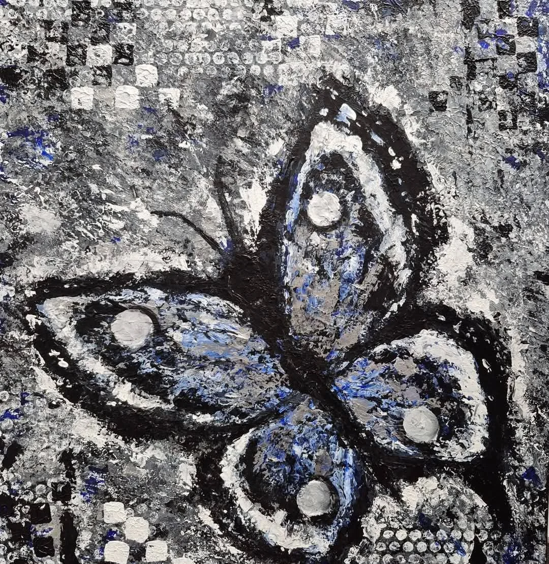 Papillon métallique