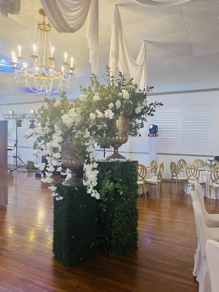 The Renaissance Room with floral displays and gold chandeliers