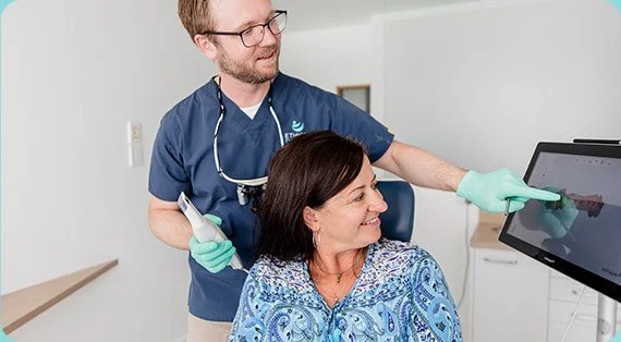 Dr Sam Rosehill with a patient at the Coffs Harbour 3D scanner