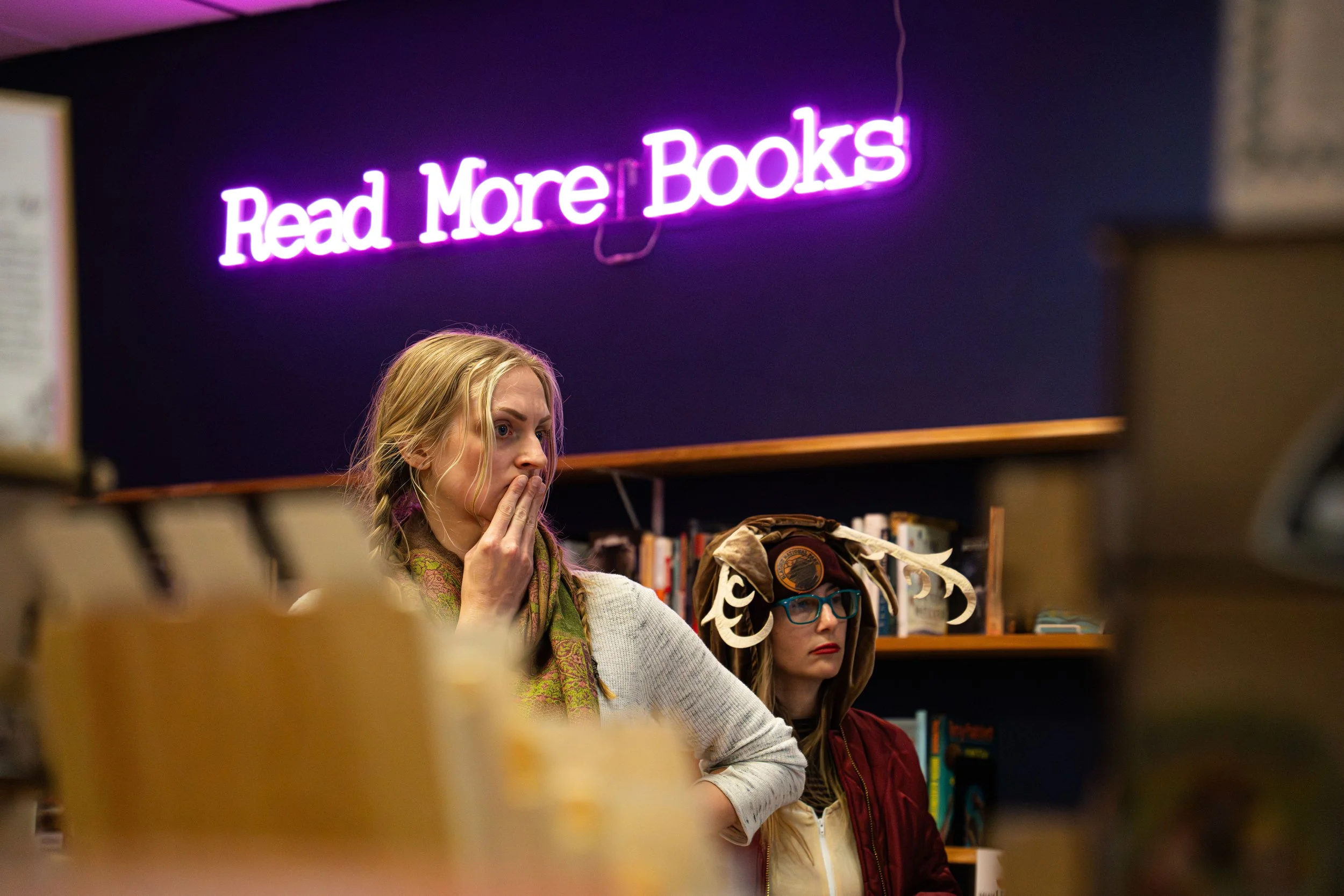 Owners Elise Jajuga and Christine Peffer overlooking the layout of the store to make sure their customers have enough room to move as they please at their Kinshop event prep at A Novel Concept on October 24th, 2025 in Lansing Mich.